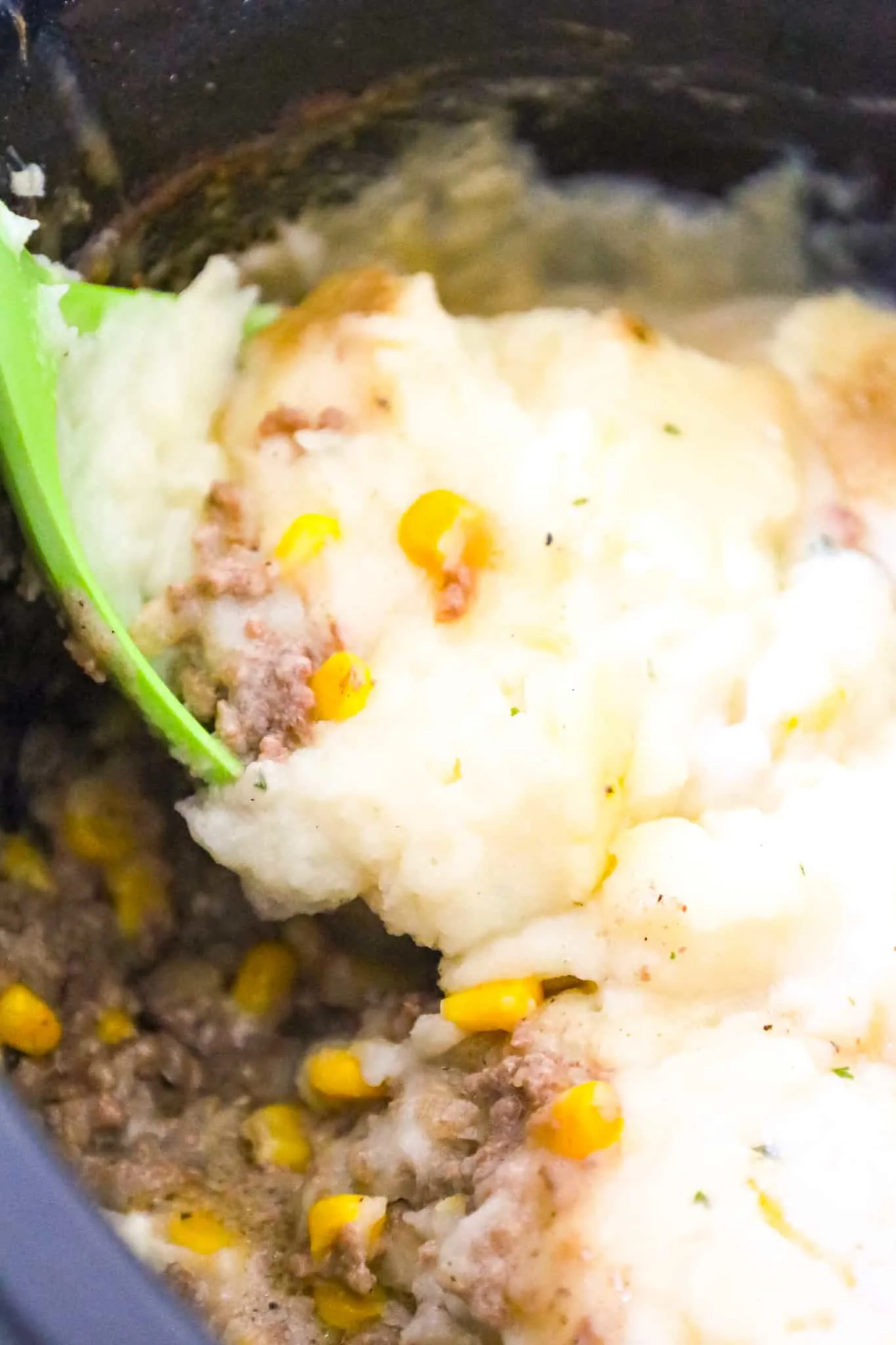 Crock Pot Shepherd's Pie is an easy slow cooker ground beef dinner recipe loaded with corn, cream of mushroom soup and mashed potatoes.