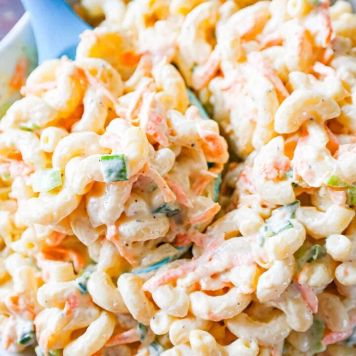 Hawaiian Macaroni Salad is a creamy pasta salad recipe loaded with grated carrots, yellow onion and chopped green onion.