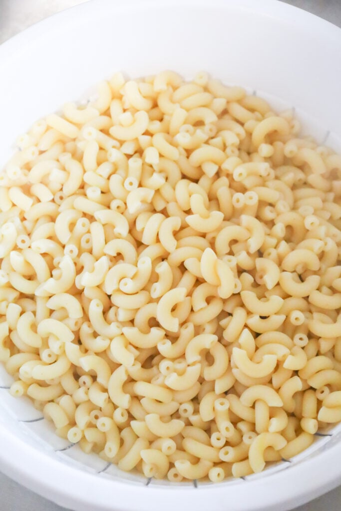 cooked macaroni in a colander