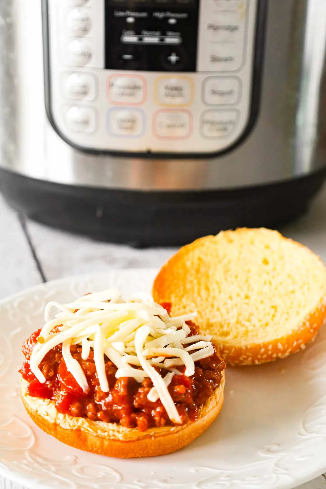 Instant Pot Sloppy Joes are an easy pressure cooker ground beef dinner recipe with a sauce made from diced tomatoes, ketchup, Worcestershire sauce and spices.