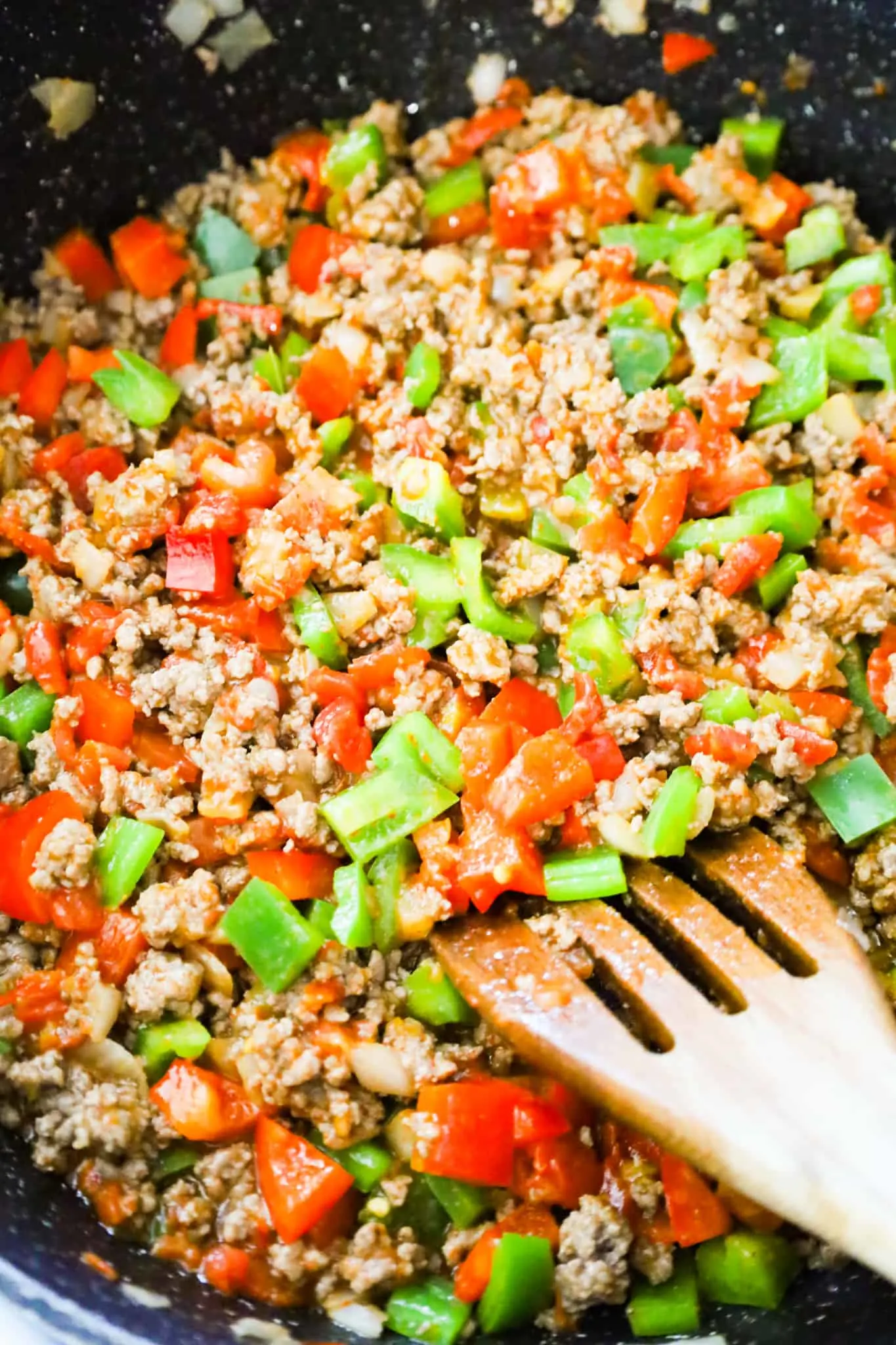 ground beef and diced peppers coated in taco seasoning
