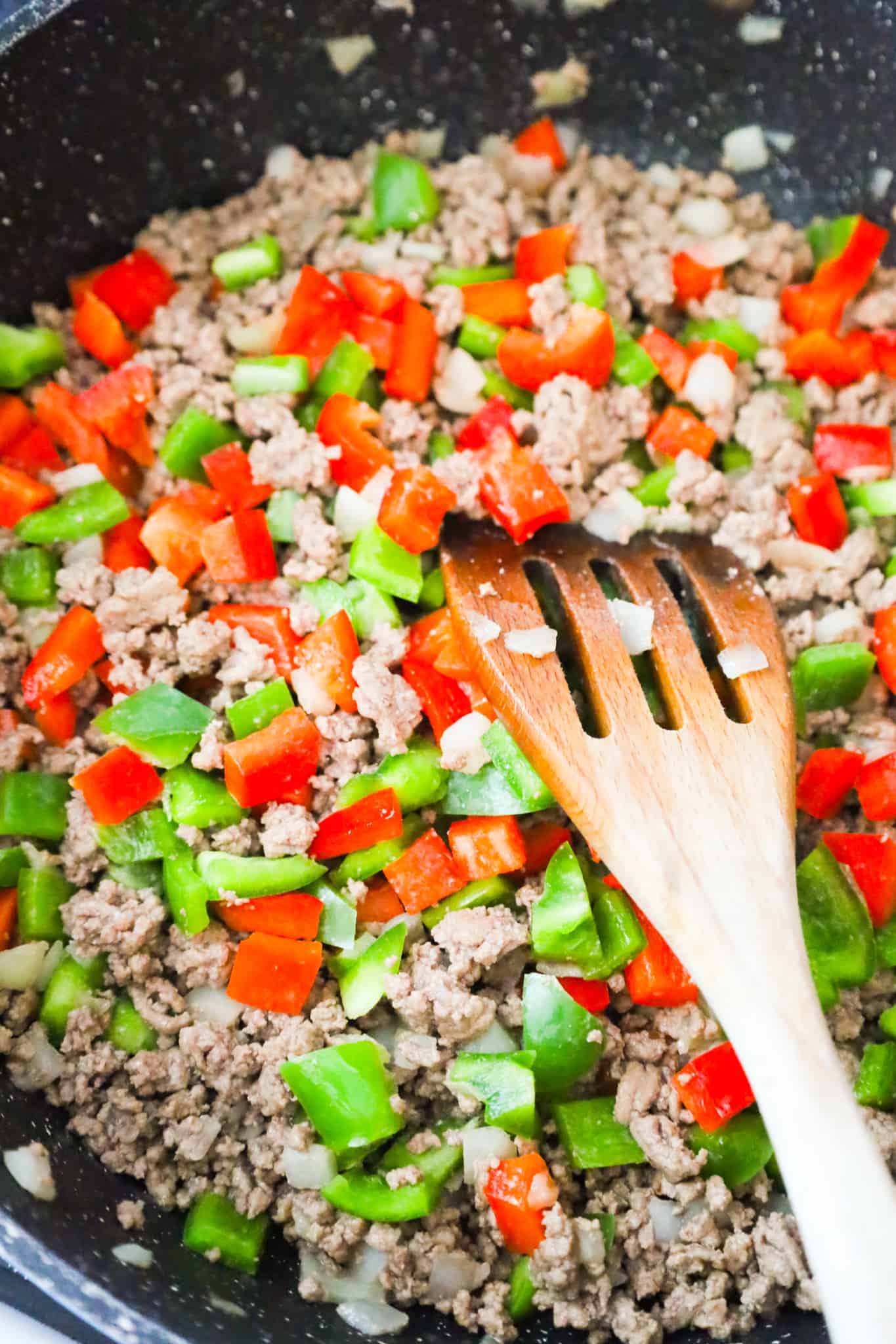 cooked ground beef tossed with diced peppers