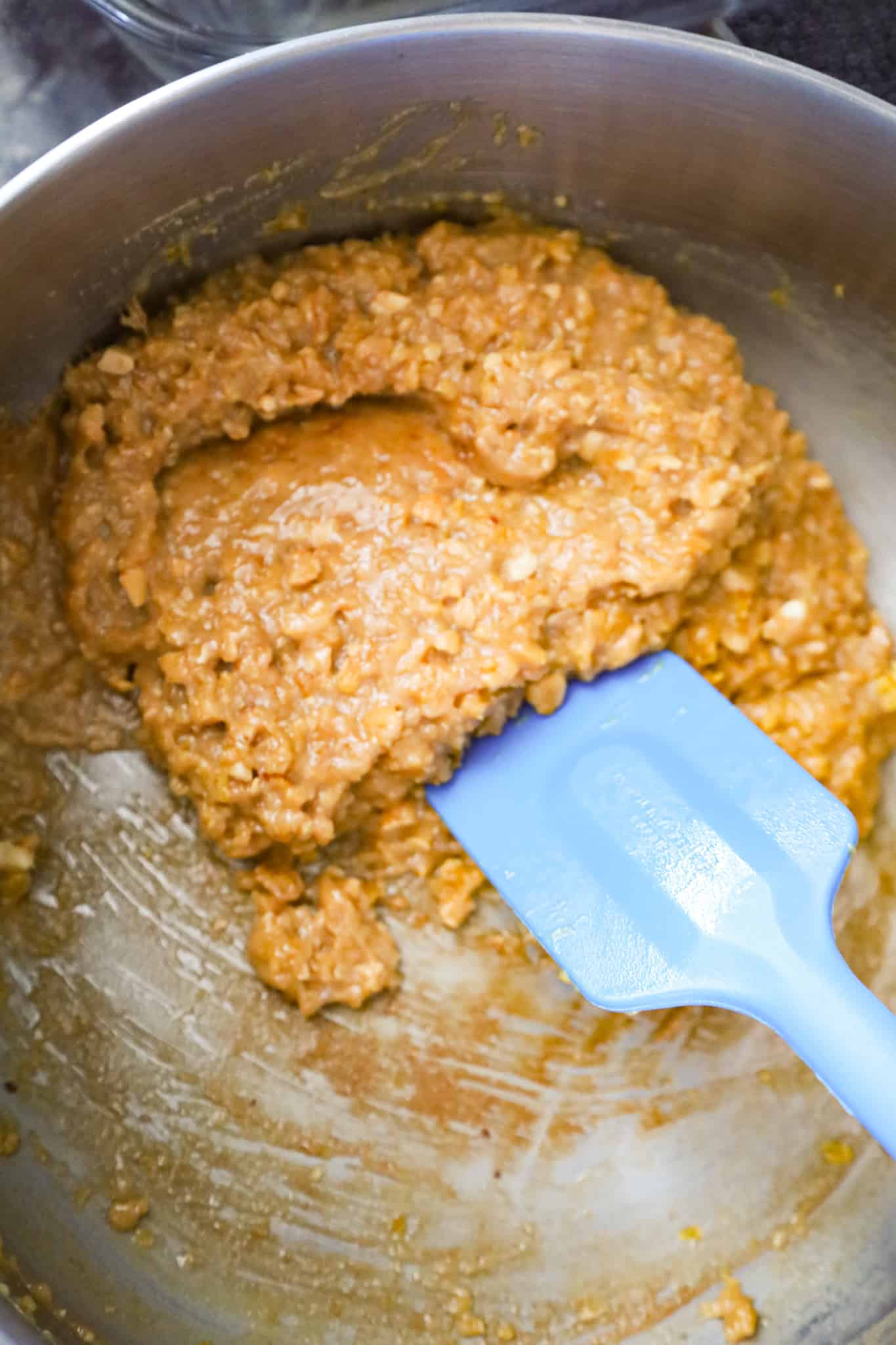 cornflake, peanut butter and corn syrup mixture in a pot