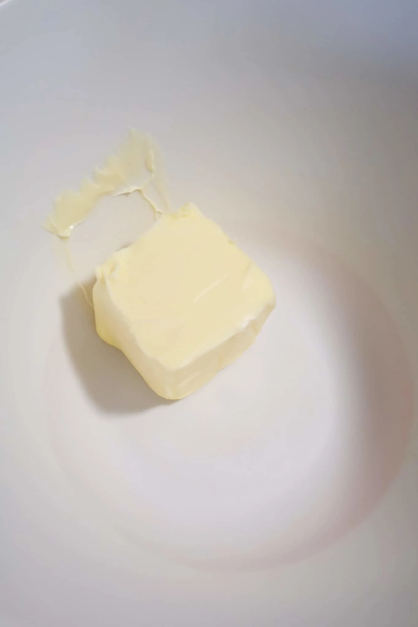softened butter in a mixing bowl