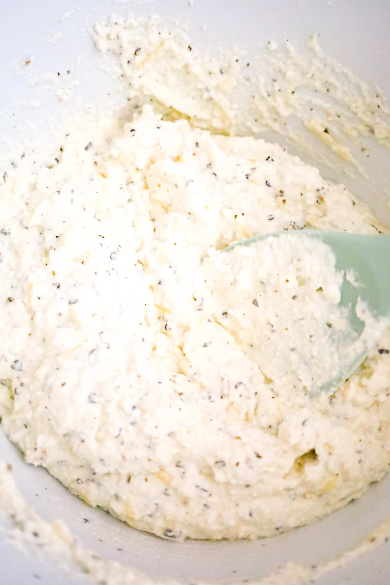 sour cream and ricotta mixture in a mixing bowl