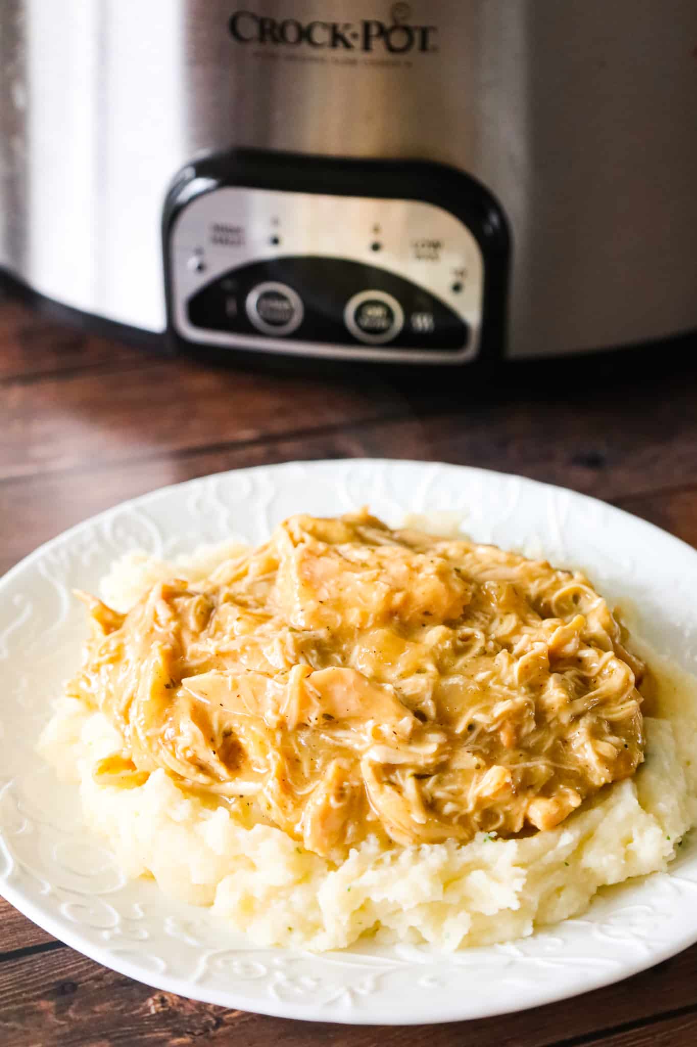 Crock Pot Chicken and Gravy is an easy slow cooker chicken recipe made with boneless, skinless chicken breasts, condensed cream of chicken soup and chicken gravy mix.