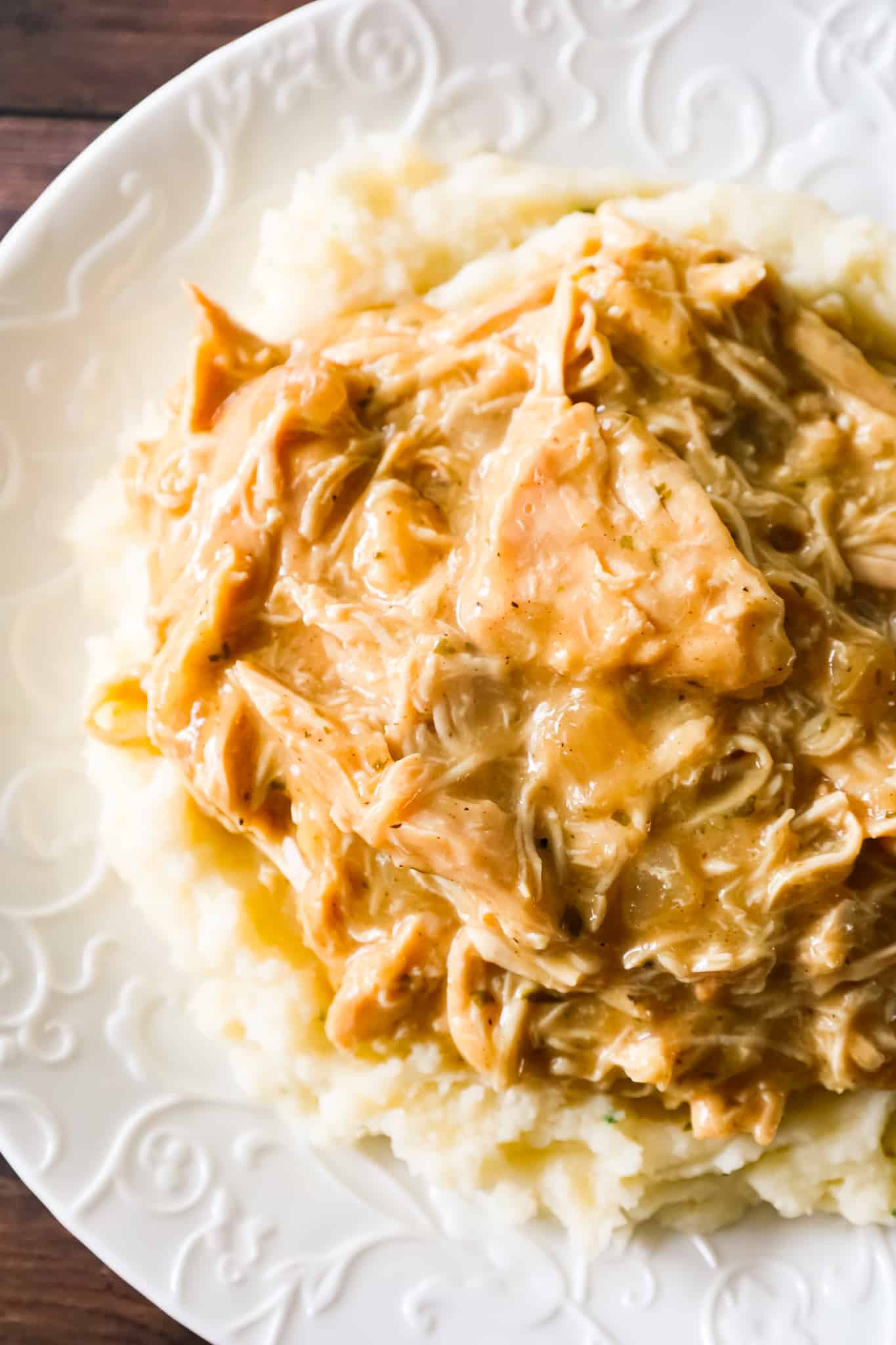 Crock Pot Chicken and Gravy is an easy slow cooker chicken recipe made with boneless, skinless chicken breasts, condensed cream of chicken soup and chicken gravy mix.