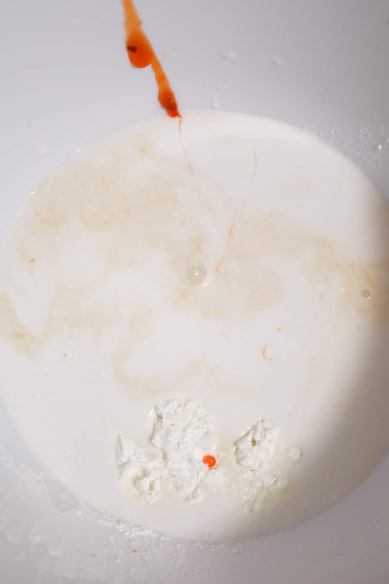 cornstarch, soy sauce, sweet chili sauce and coconut milk in a mixing bowl