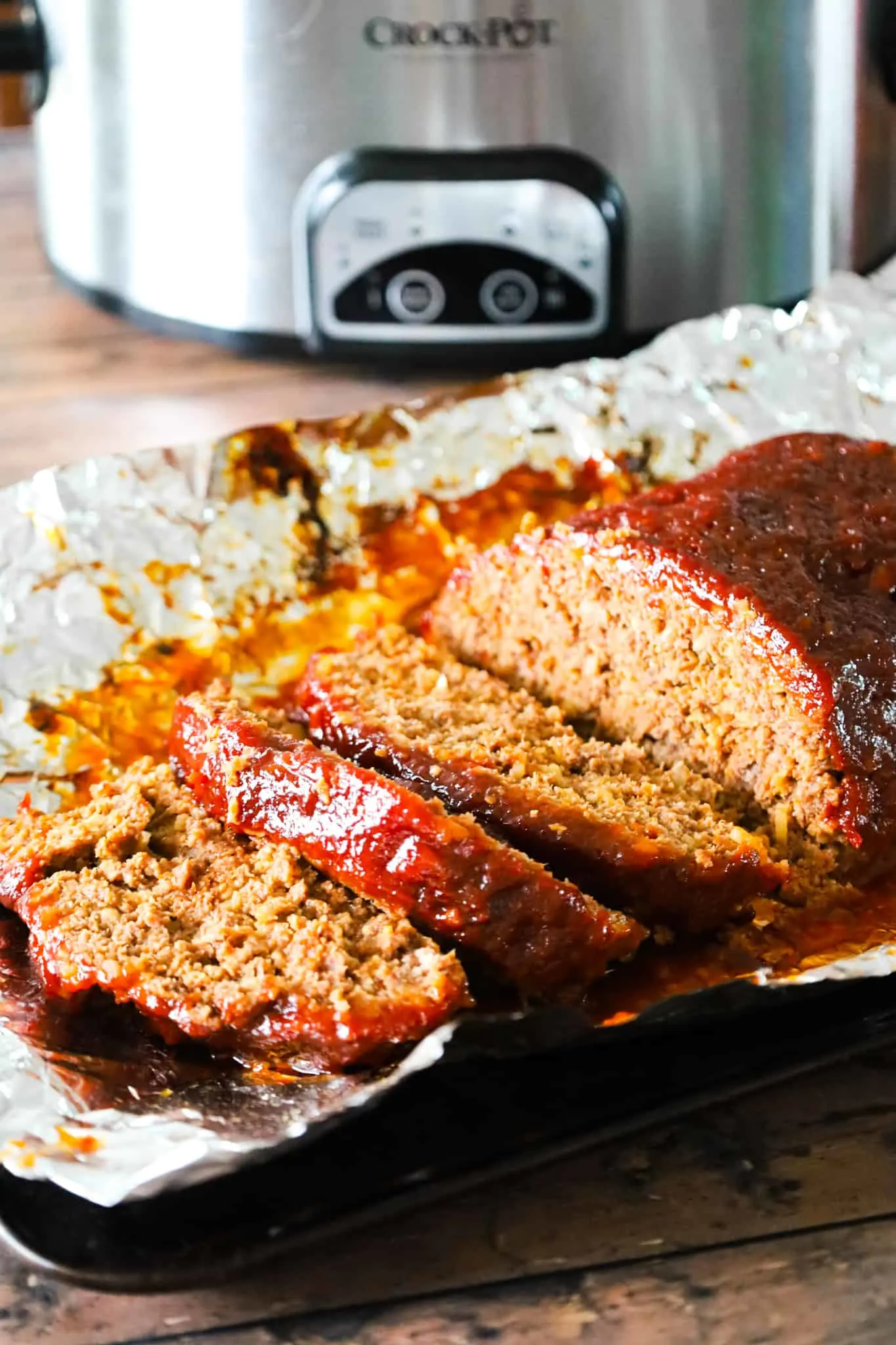 Crock Pot Meatloaf is an easy slow cooker ground beef meatloaf recipe made with crushed Ritz crackers and Lipton onion soup mix.