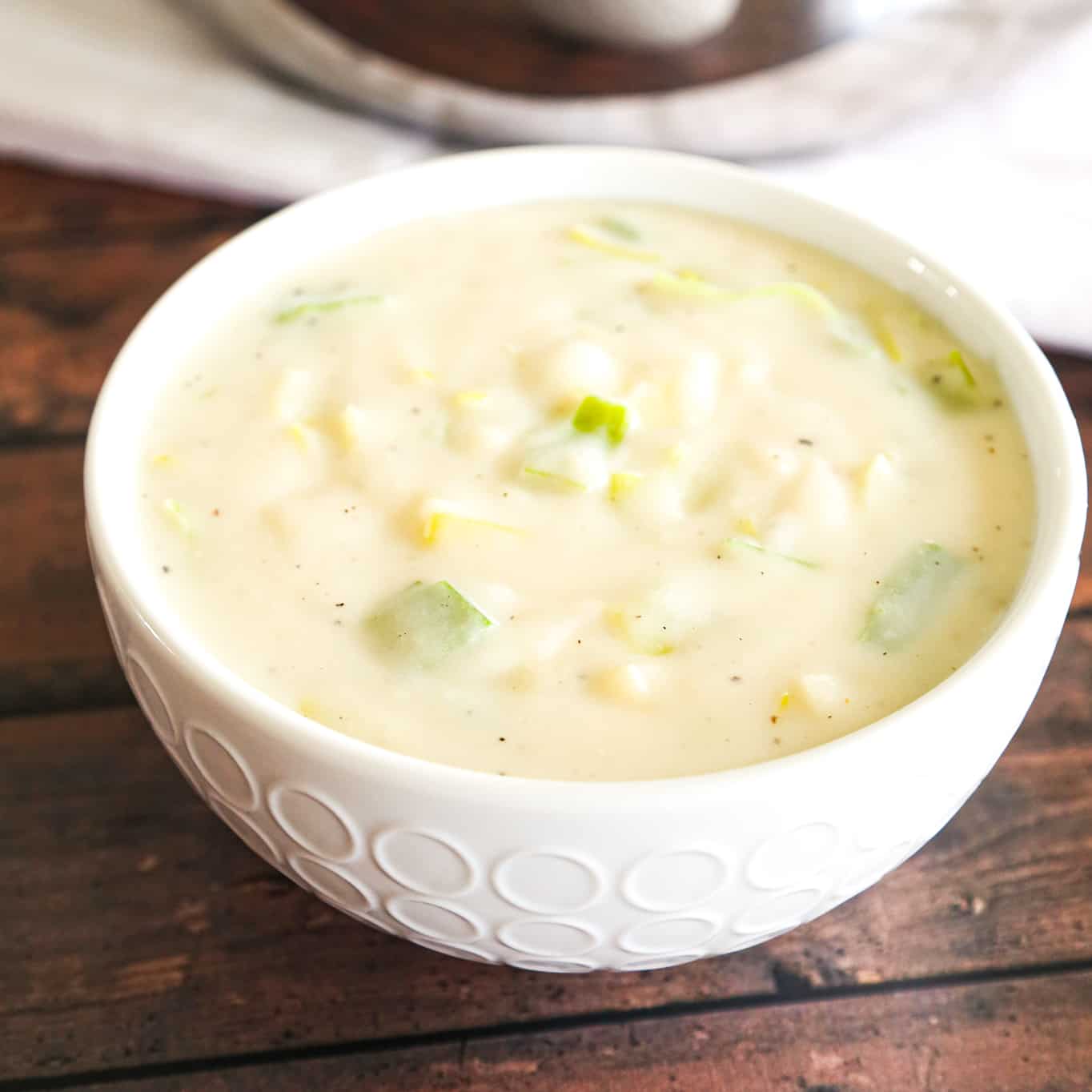 Easy Potato Leek Soup is a hearty soup recipe made with chopped leeks, instant mashed potatoes, chicken broth and milk.
