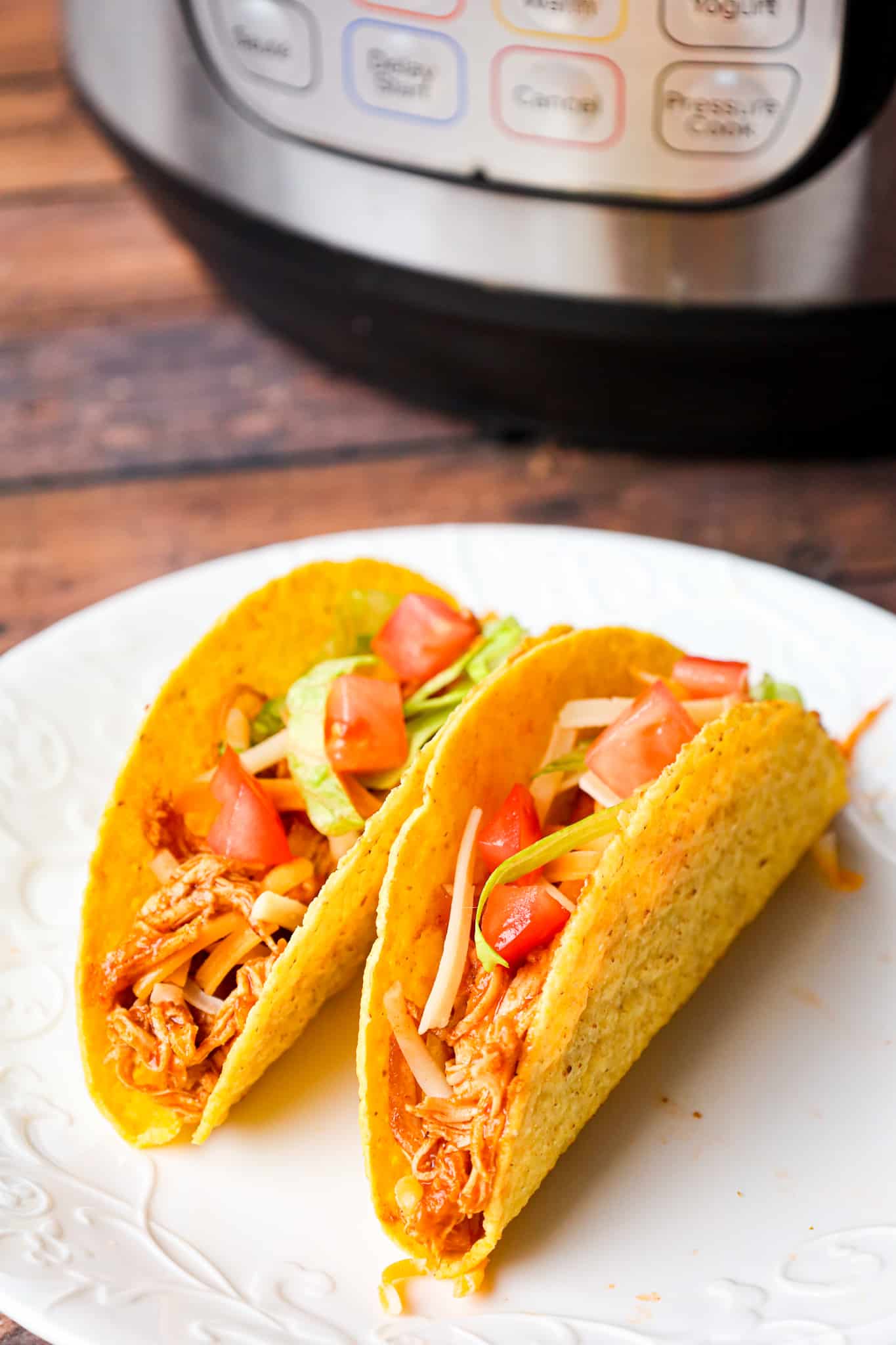 Instant Pot Chicken Tacos is are an easy pressure cooker chicken dinner recipe perfect for weeknights.