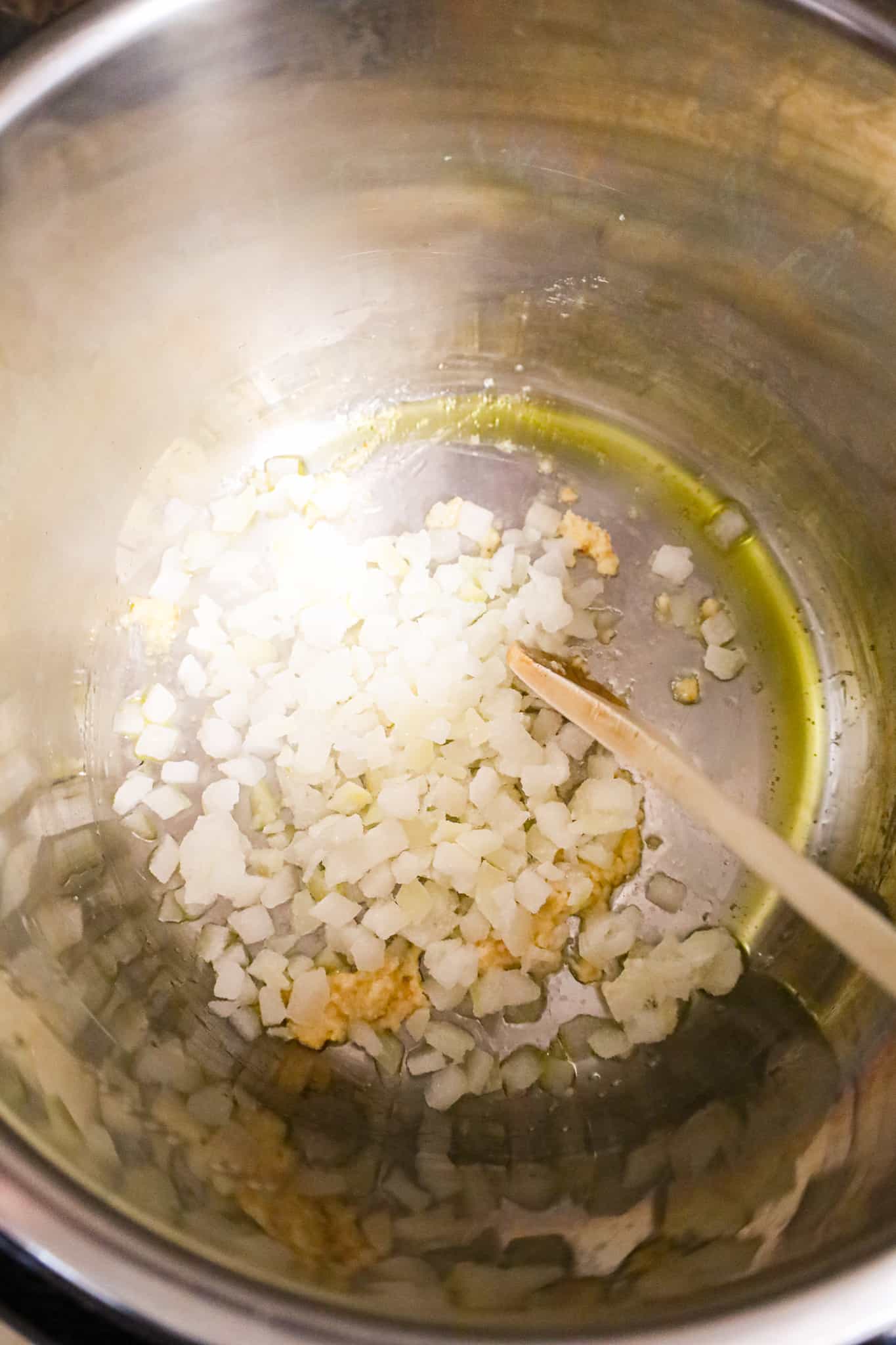 garlic puree, olive oil and diced onions in an Instant Pot