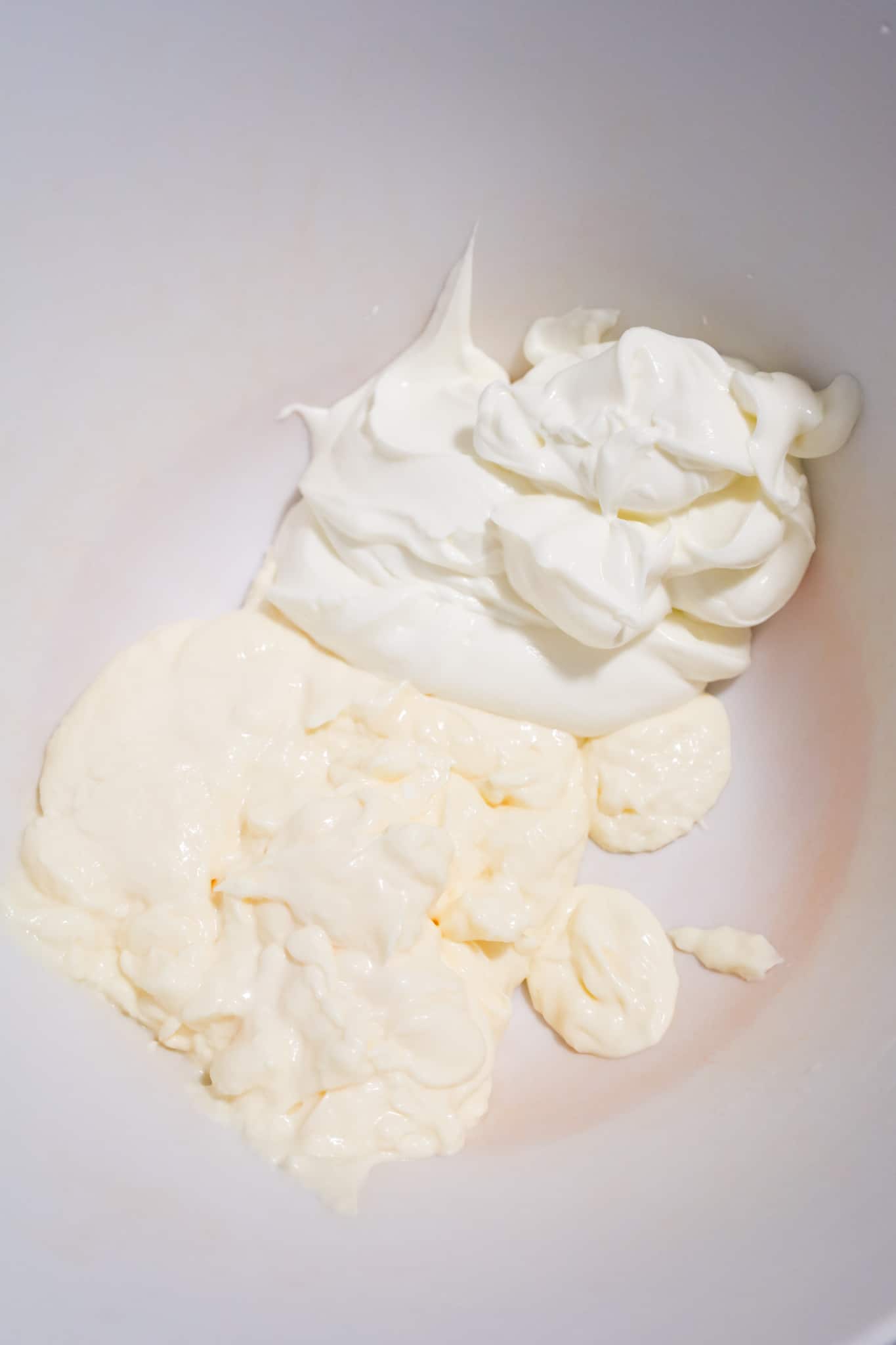 sour cream and mayo mixture in a mixing bowl
