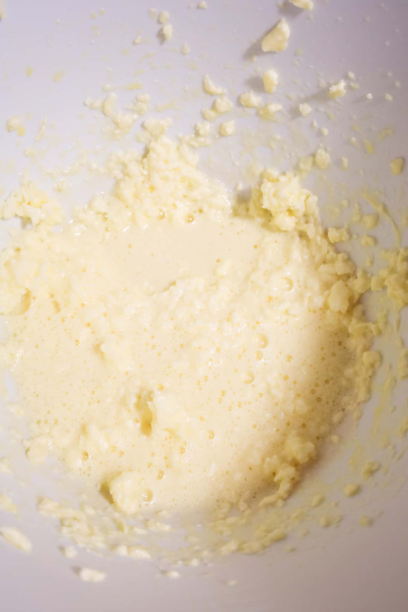 egg and butter mixture in a mixing bowl