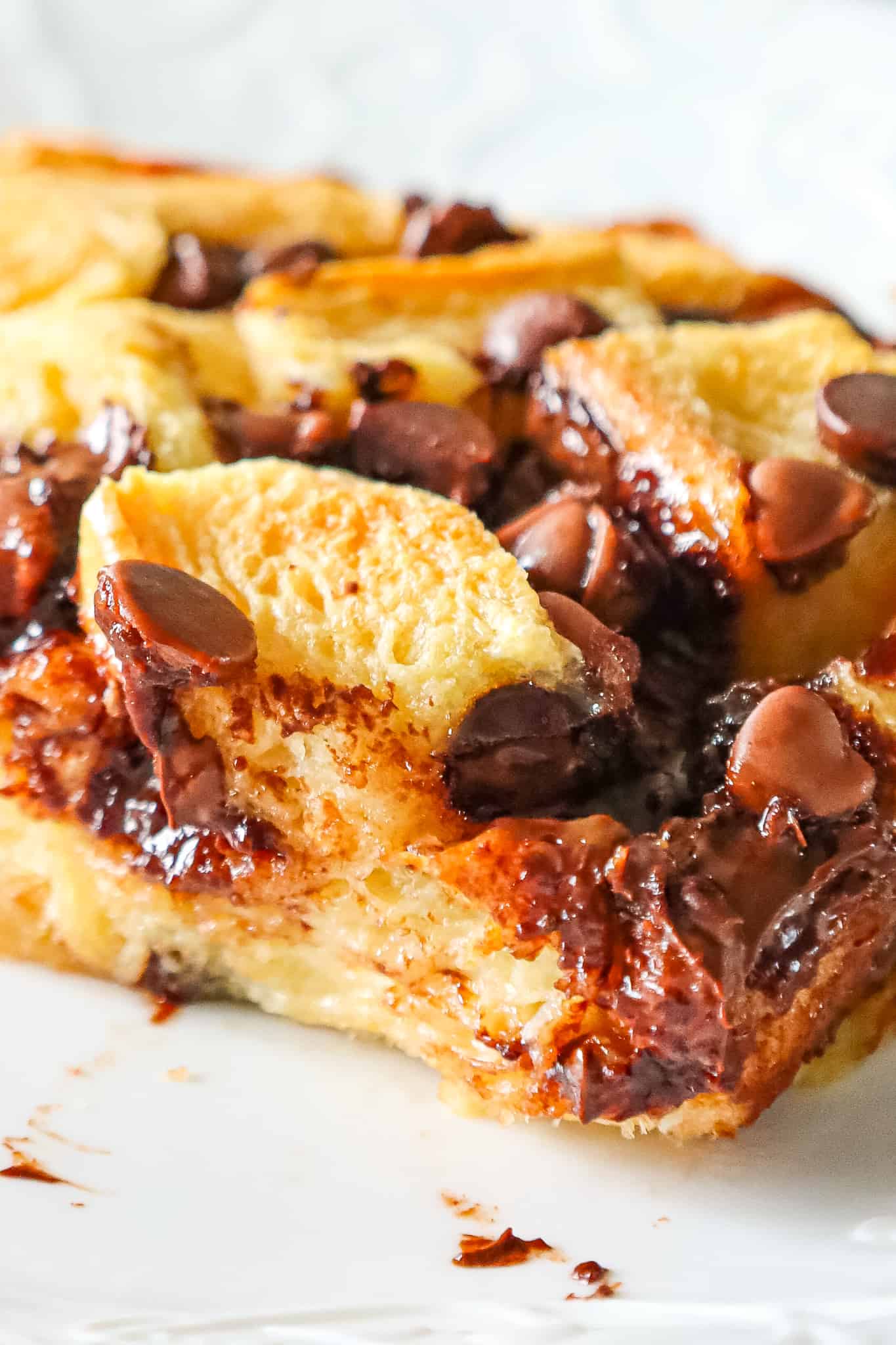 Chocolate Chip Bread Pudding is an easy dessert recipe using brioche bread and loaded with semi sweet and milk chocolate chips.