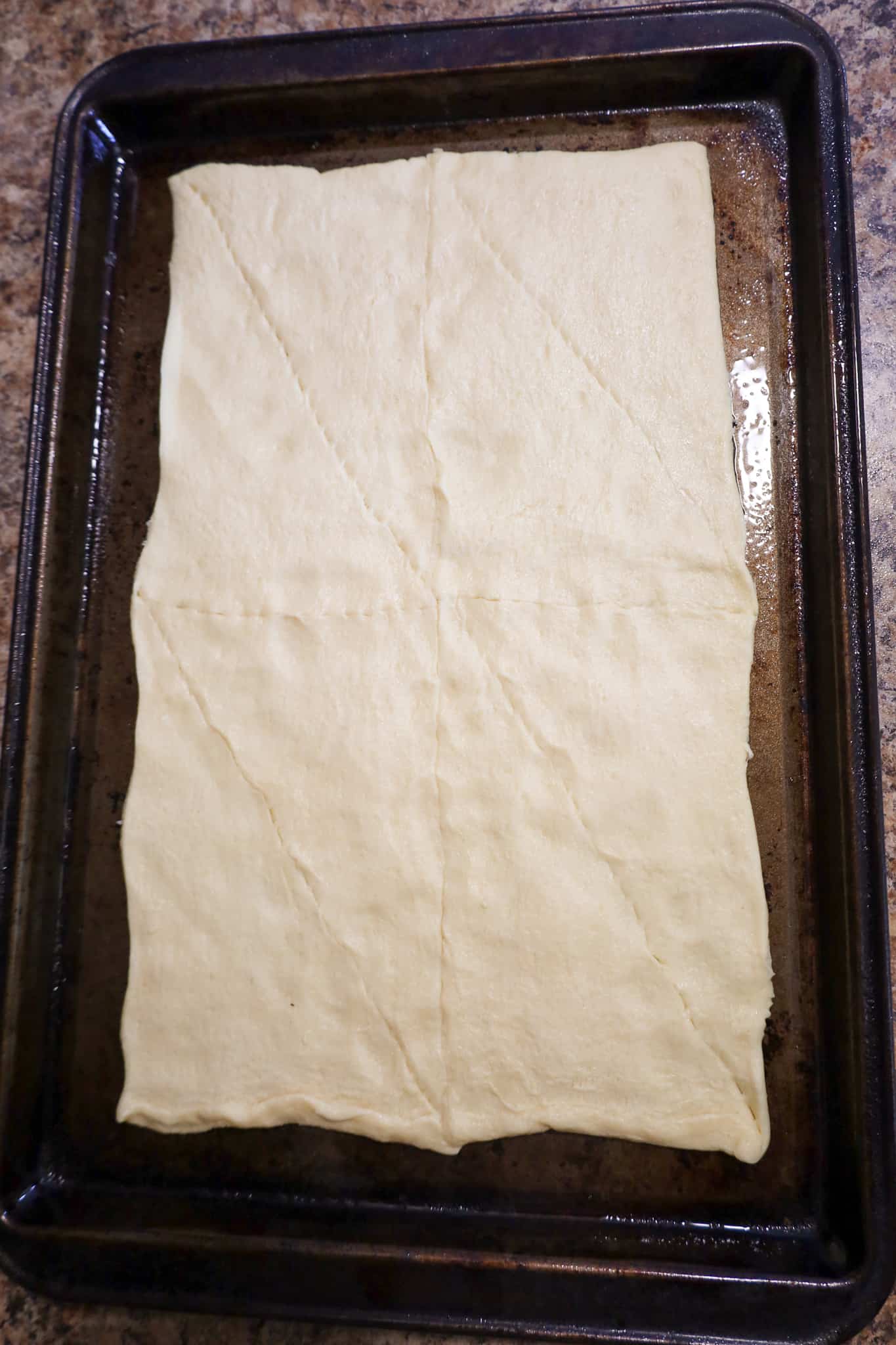 crescent roll dough with seams pressed together
