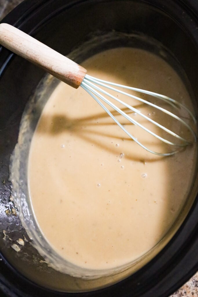 whisking gravy in a crock pot