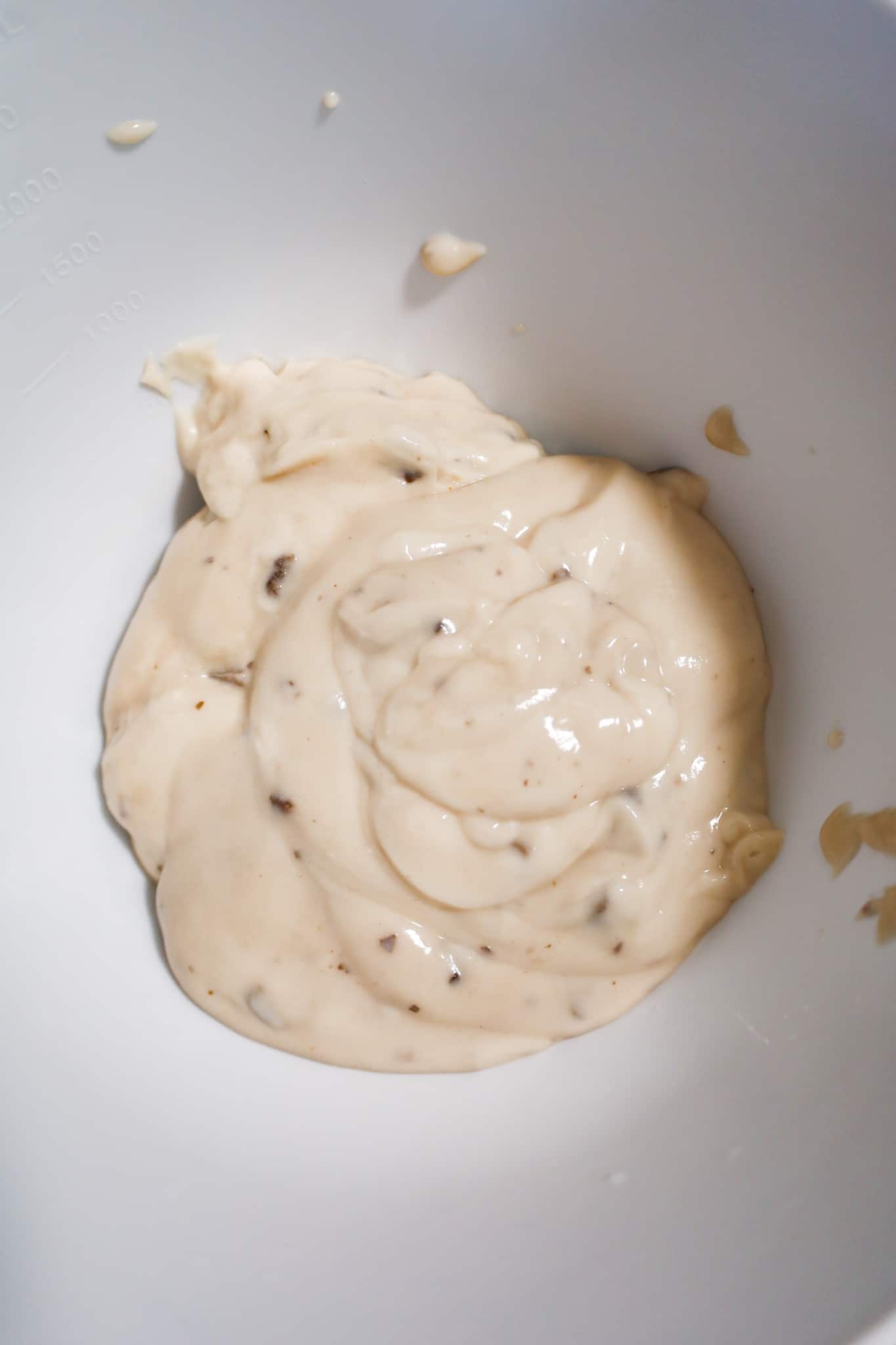 condensed cream of mushroom soup in a mixing bowl