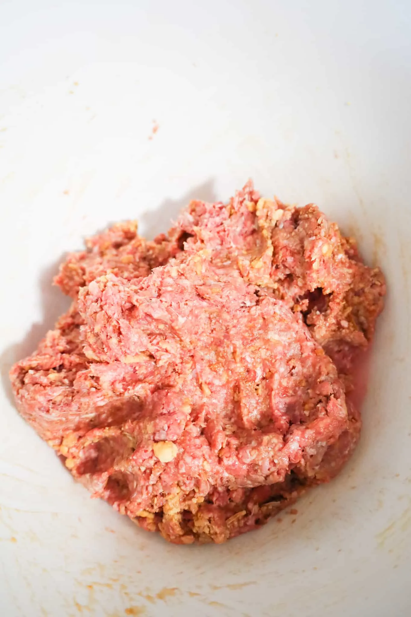 raw ground beef mixture in a mixing bowl