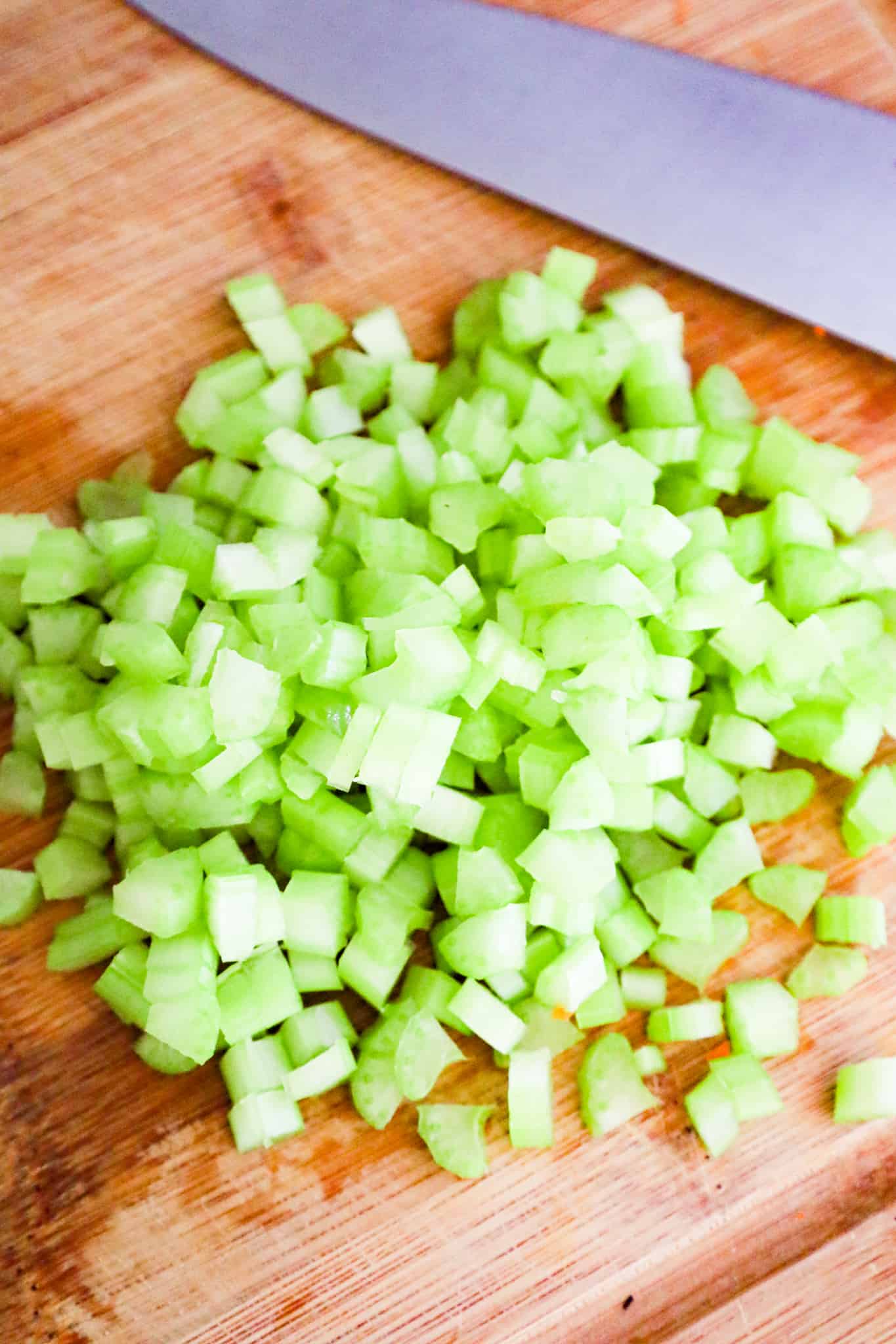 diced celery on a cutting board