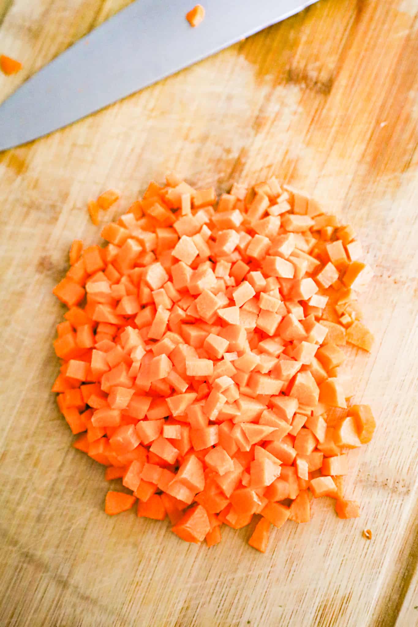 diced carrots on a cutting board