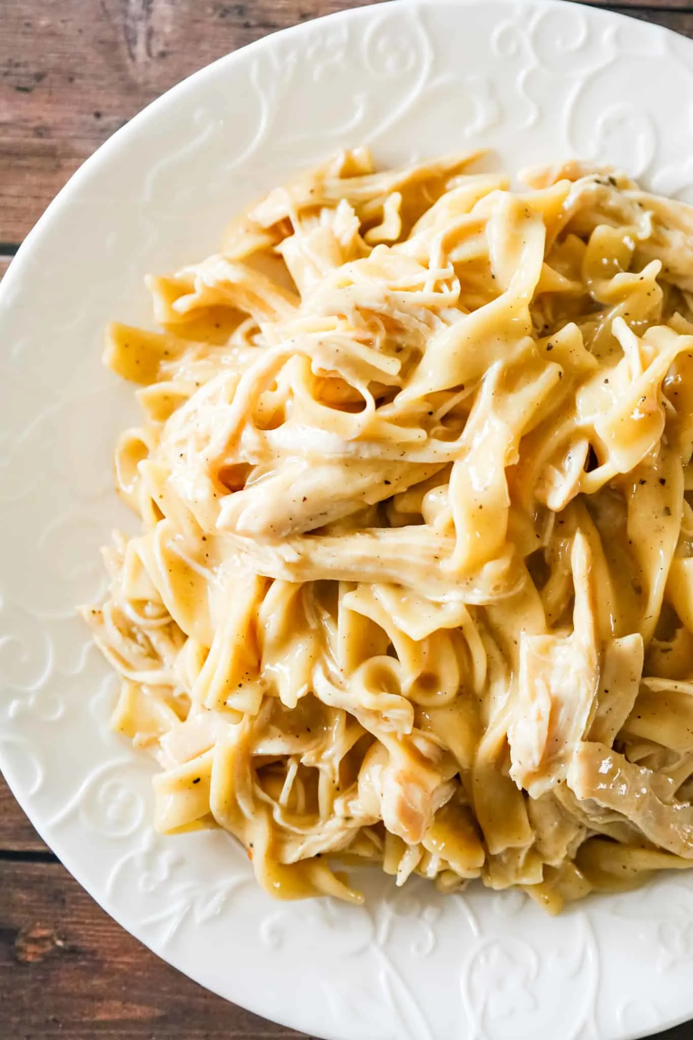 Instant Pot Chicken and Noodles is an easy pressure cooker dinner recipe using boneless, skinless chicken breasts and egg noodles in a sauce made with chicken broth, cream of chicken soup and chicken gravy mix.