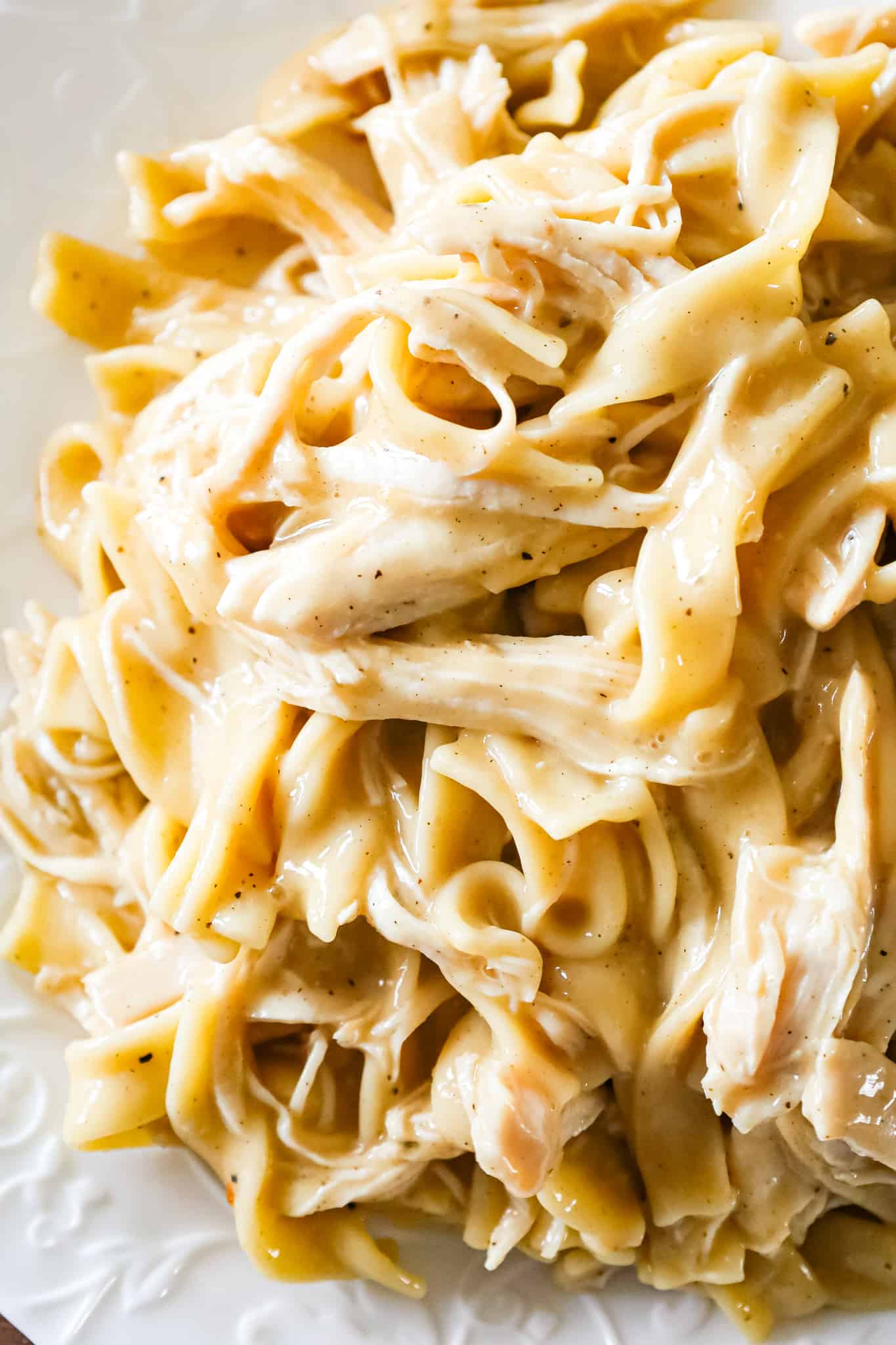 Instant Pot Chicken and Noodles is an easy pressure cooker dinner recipe using boneless, skinless chicken breasts and egg noodles in a sauce made with chicken broth, cream of chicken soup and chicken gravy mix.