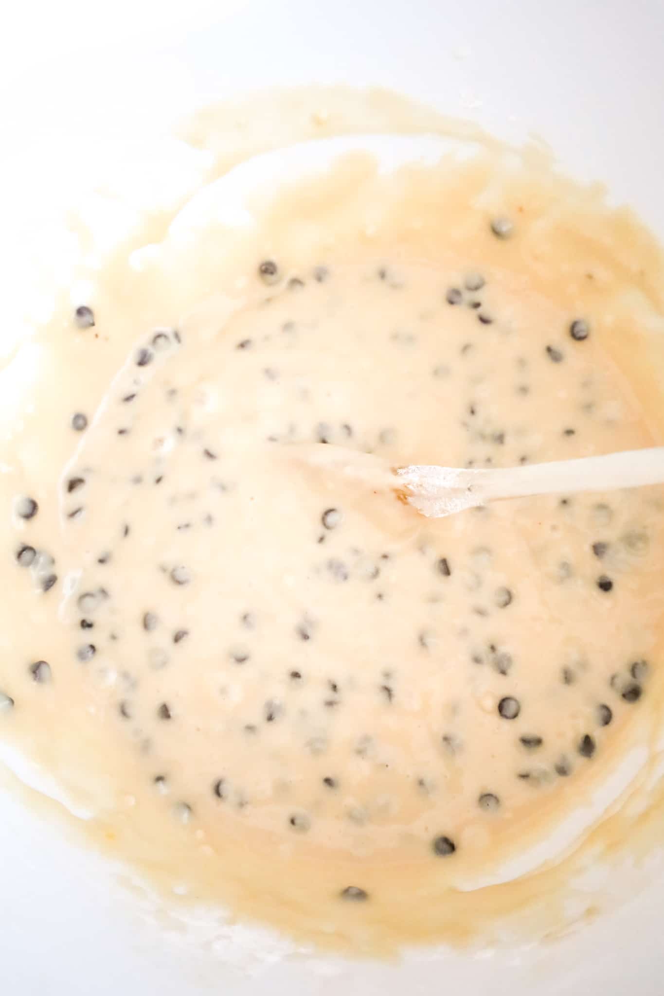 chocolate chip muffin batter in a mixing bowl
