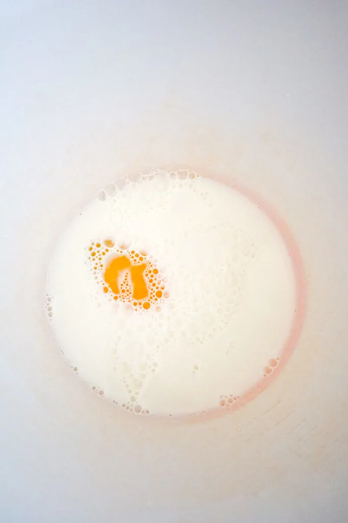 egg and milk in a mixing bowlbowl