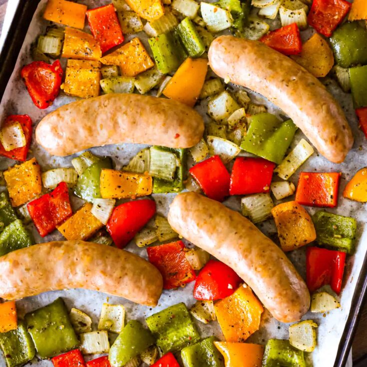 Oven Baked Italian Sausage is an easy sheet pan dinner with diced bell peppers and onions tossed in olive oil and Italian seasoning.