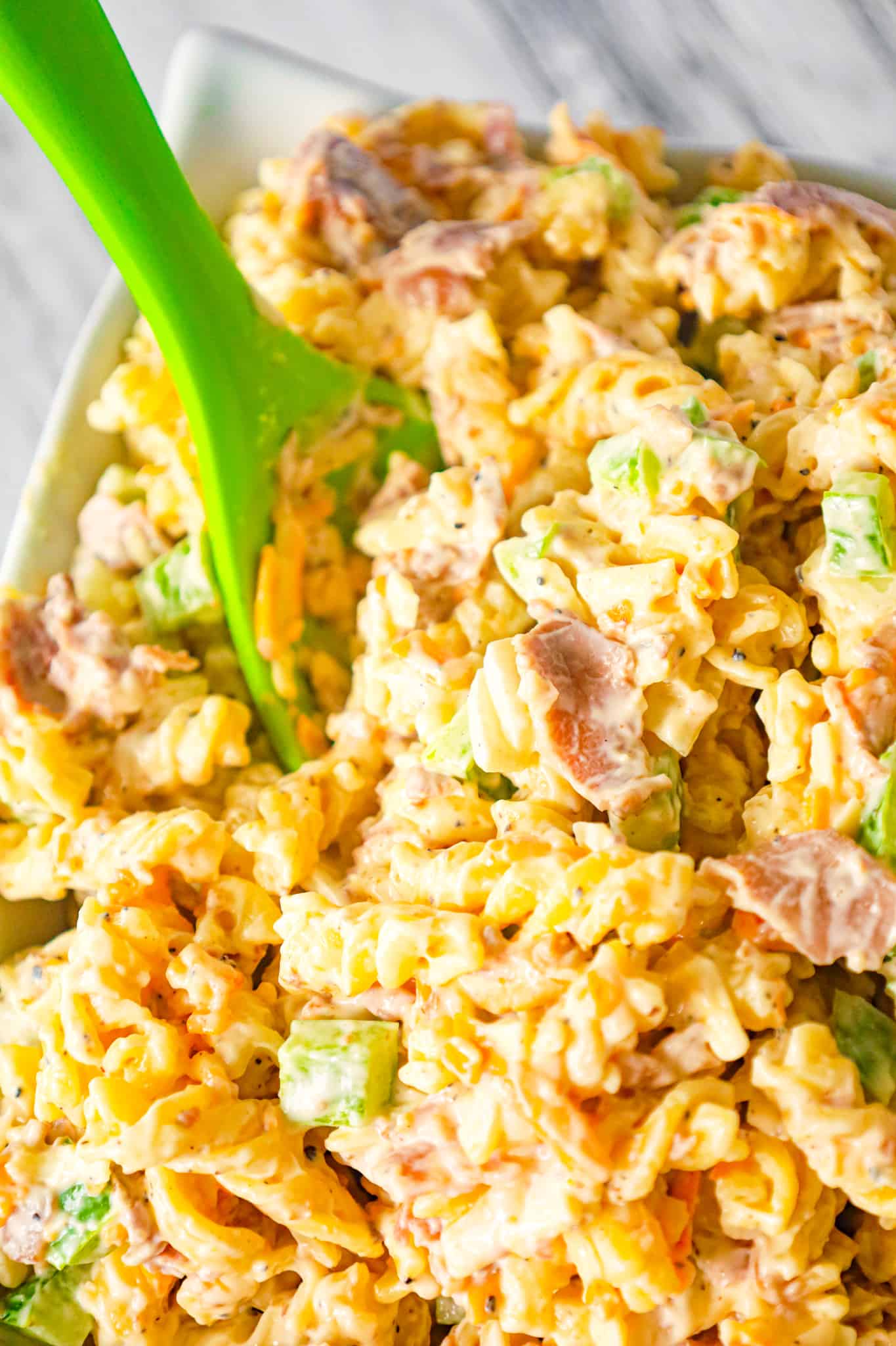 Philly Cheese Steak Pasta Salad is a tasty cold side dish recipe loaded with diced green peppers, onions, roast beef, mayo, shredded cheese and steak spice.