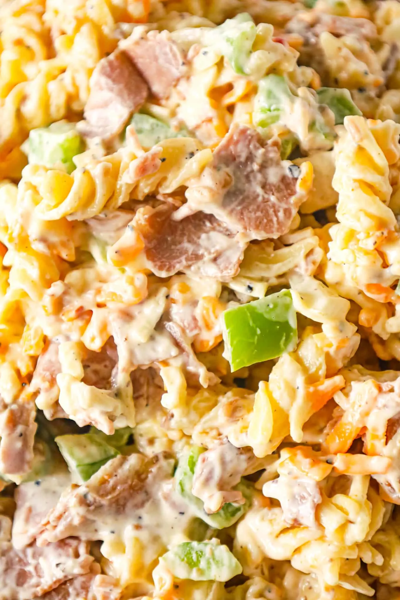 Philly Cheese Steak Pasta Salad is a tasty cold side dish recipe loaded with diced green peppers, onions, roast beef, mayo, shredded cheese and steak spice.