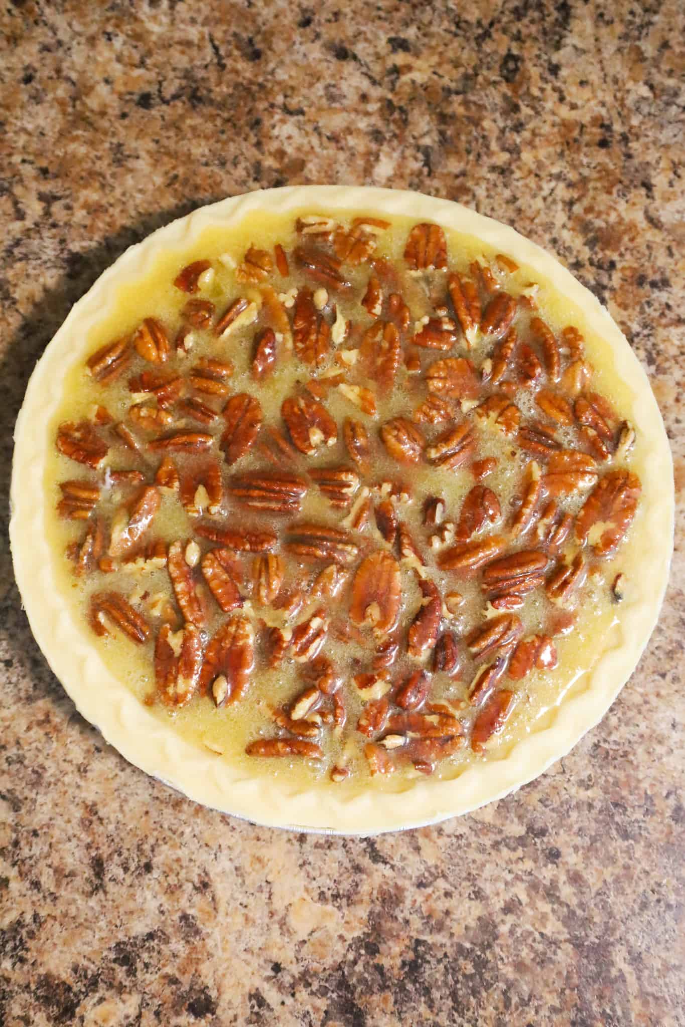 pecan pumpkin pie before baking