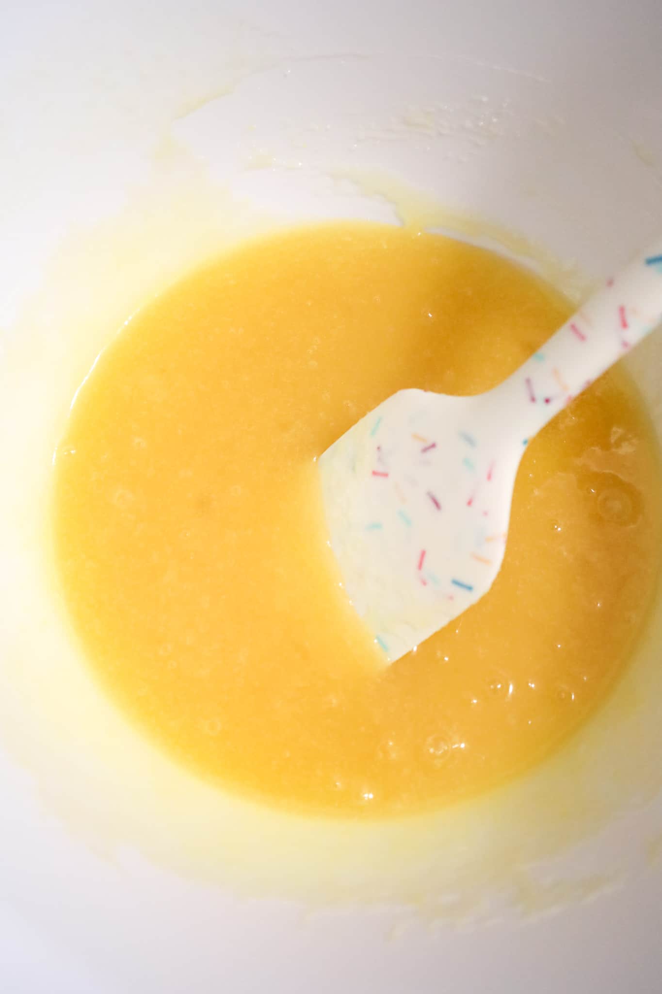 egg, sugar and melted butter mixture in a mixing bowl