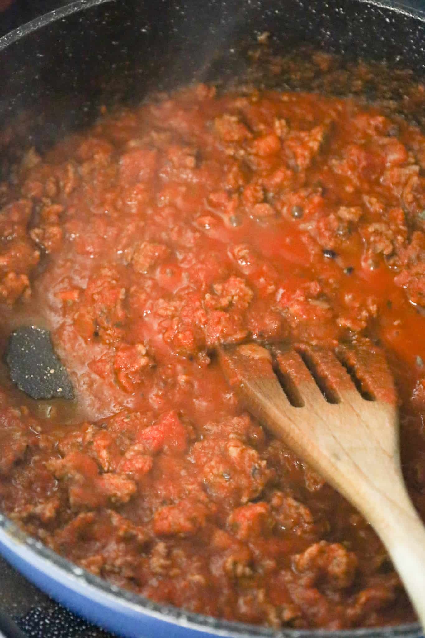 ground beef and marinara mixture in a saute pan