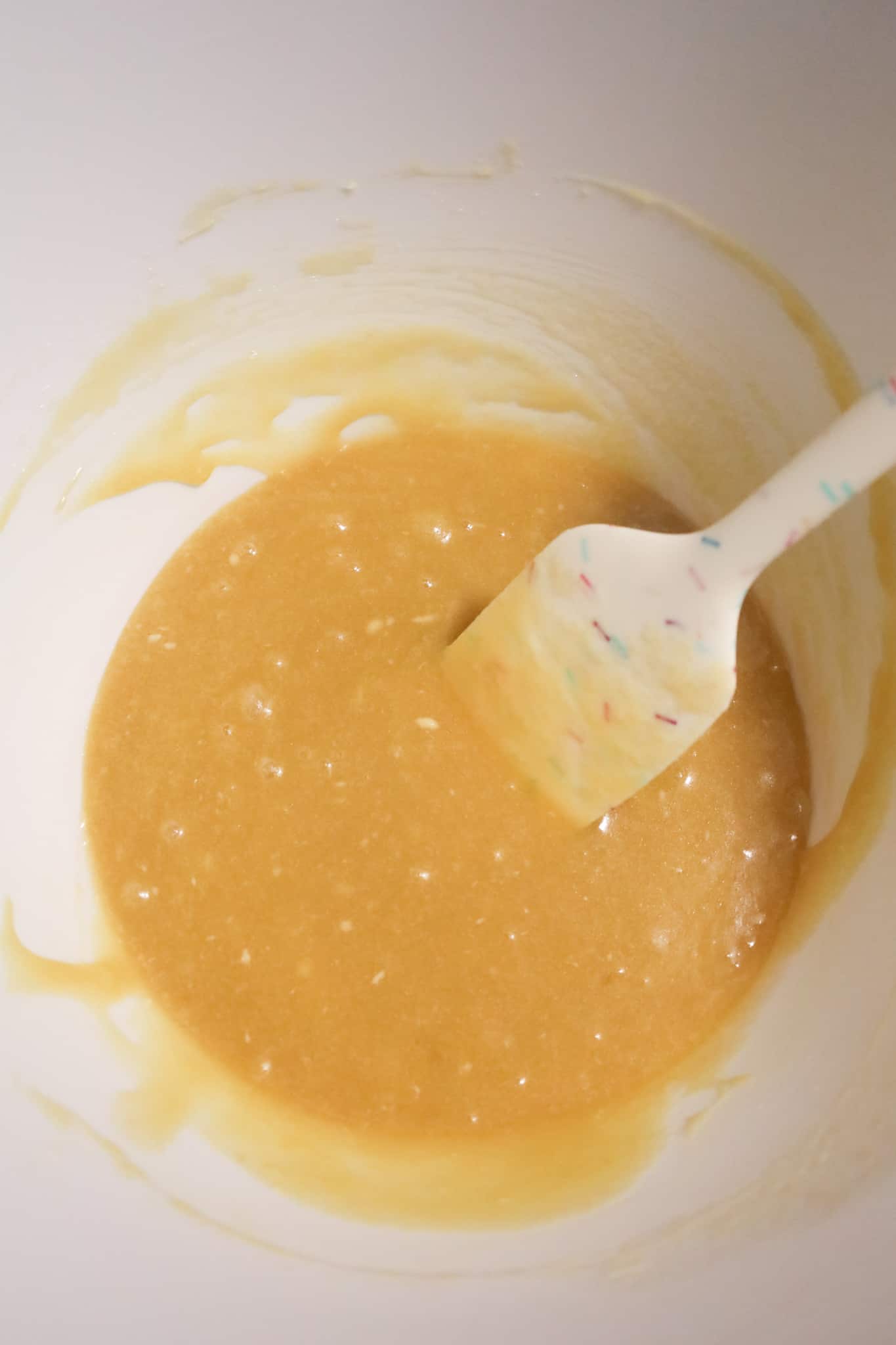 sugar, egg and melted butter mixture in a mixing bowl