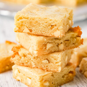 Vanilla Brownies are delicious chewy blonde brownies loaded with white chocolate chips.