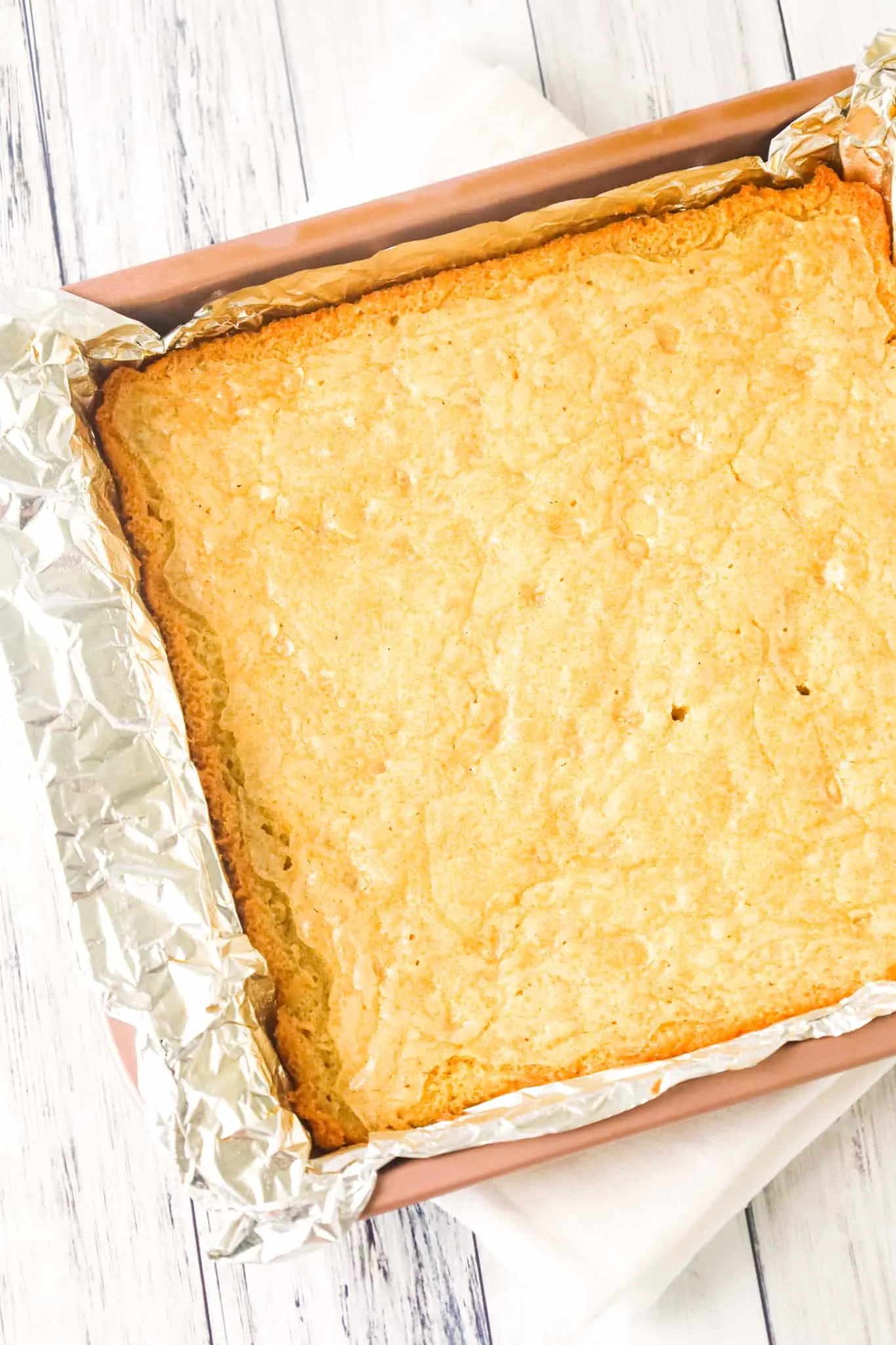 Vanilla Brownies are delicious chewy blonde brownies loaded with white chocolate chips.