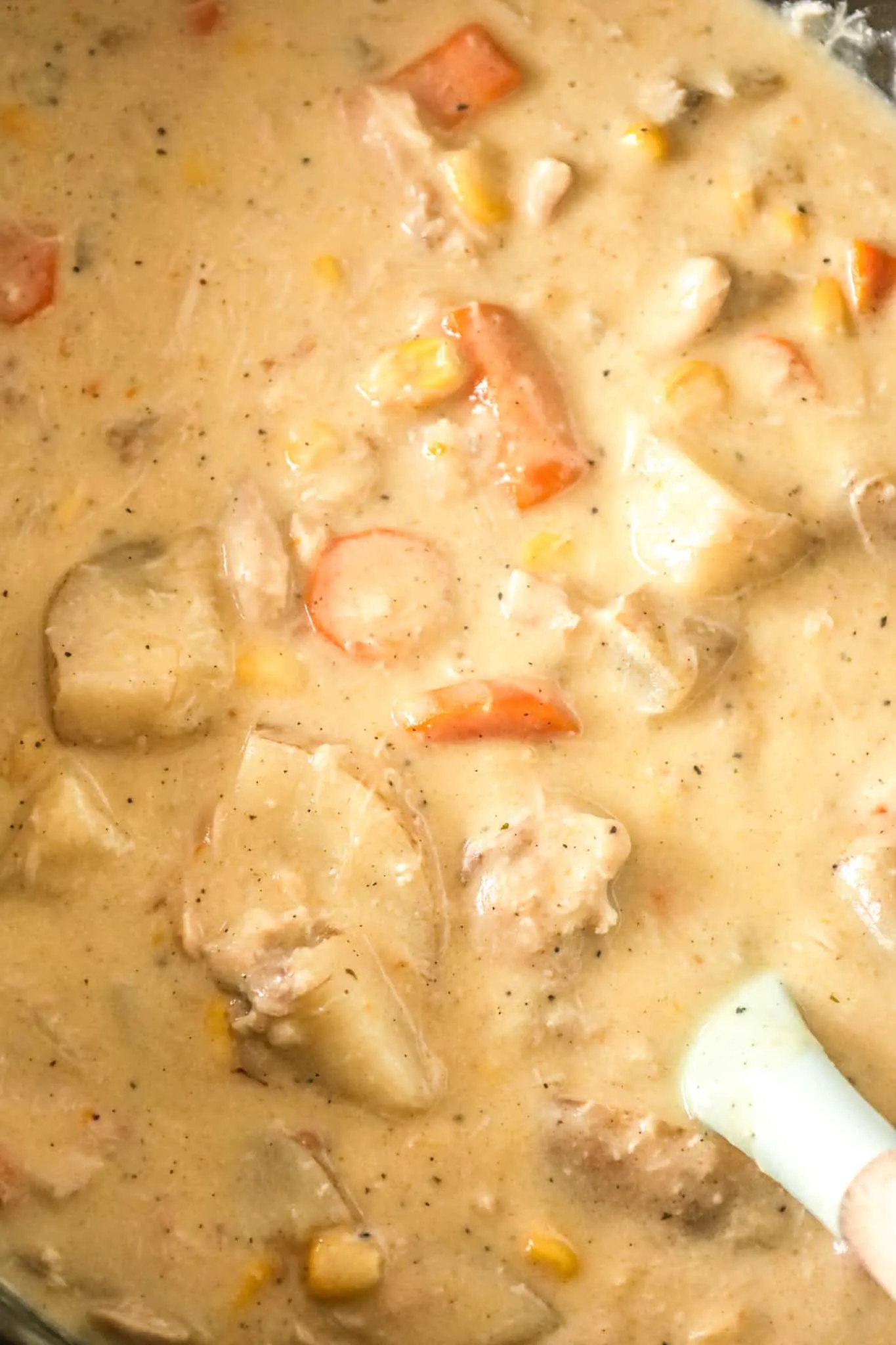 Crock Pot Chicken Stew is a hearty slow cooker dinner recipe loaded with chicken thigh chunks, russet potatoes, carrots, onions and corn all cooked in a creamy chicken soup mixture.