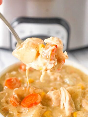 Crock Pot Chicken Stew is a hearty slow cooker dinner recipe loaded with chicken thigh chunks, russet potatoes, carrots, onions and corn all cooked in a creamy chicken soup mixture.