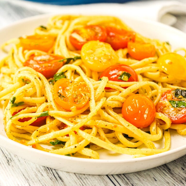 Linguine Positano is a delicious pasta dish loaded with fresh cherry tomatoes, onions, basil, parsley and garlic puree all tossed in olive oil.