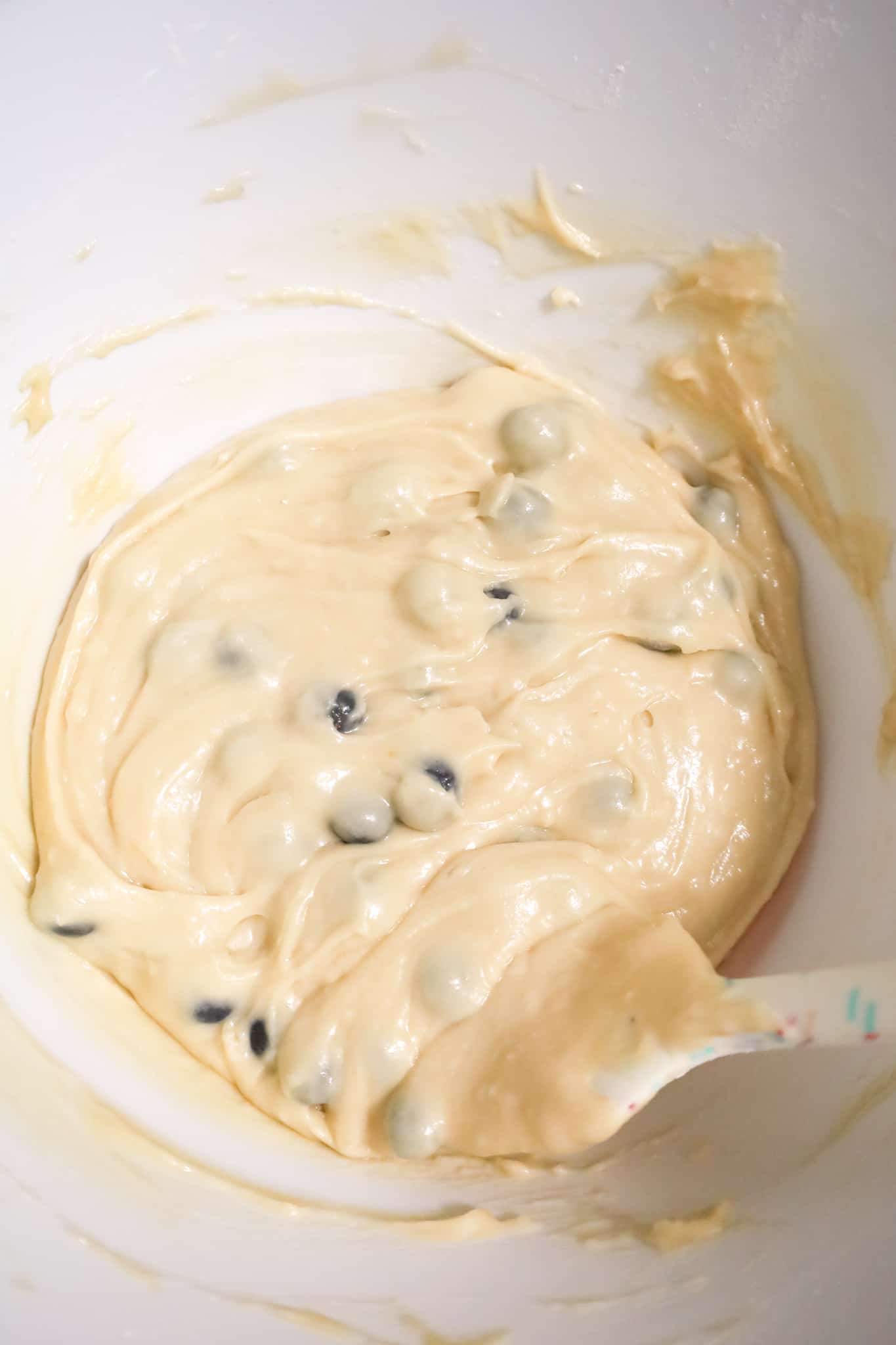 blueberries stirred into muffin batter