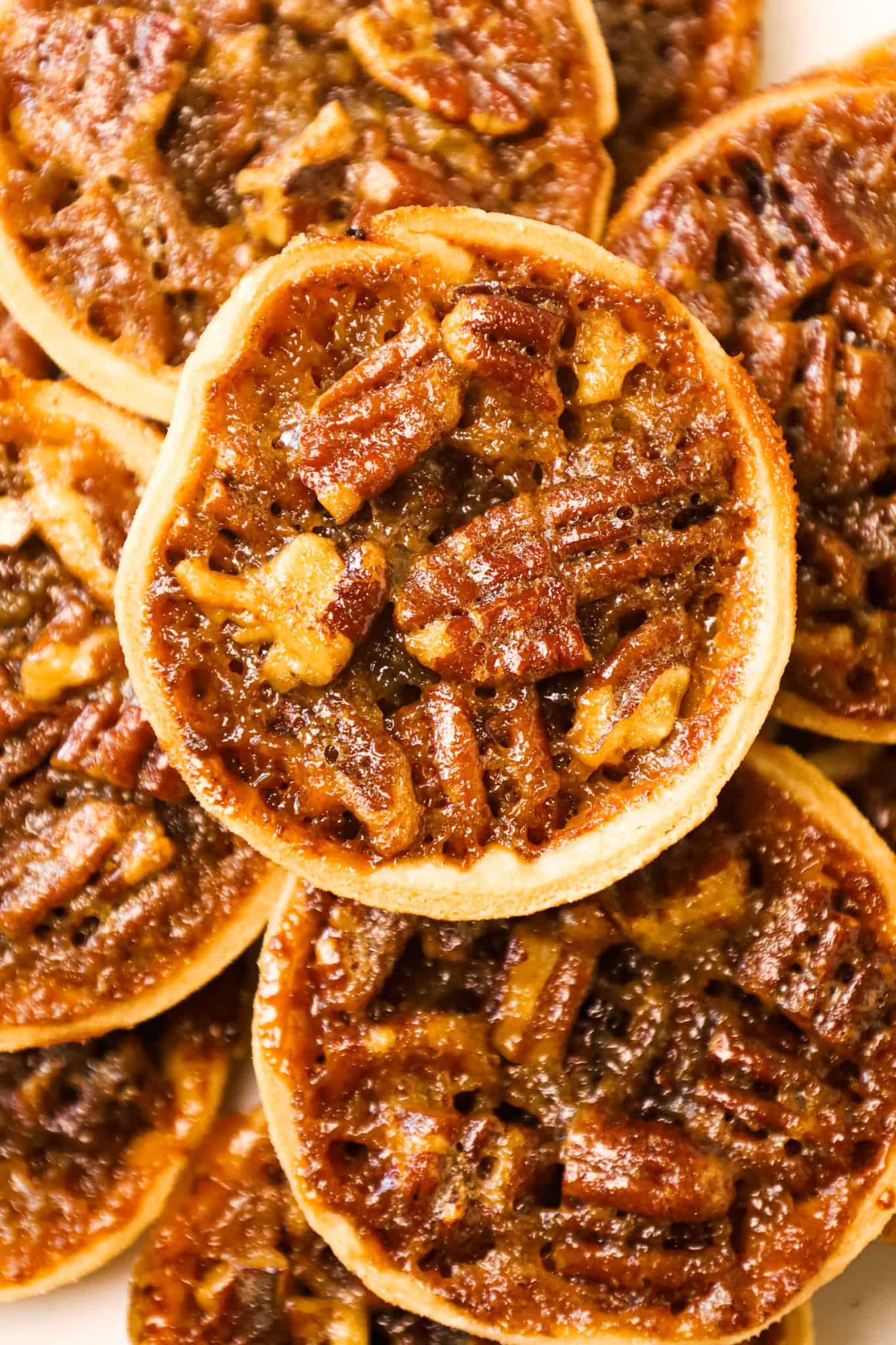 Pecan Tarts are delicious pastries with a sweet caramel and chopped pecan filling.