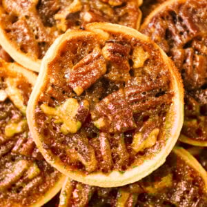 Pecan Tarts are delicious pastries with a sweet caramel and chopped pecan filling.