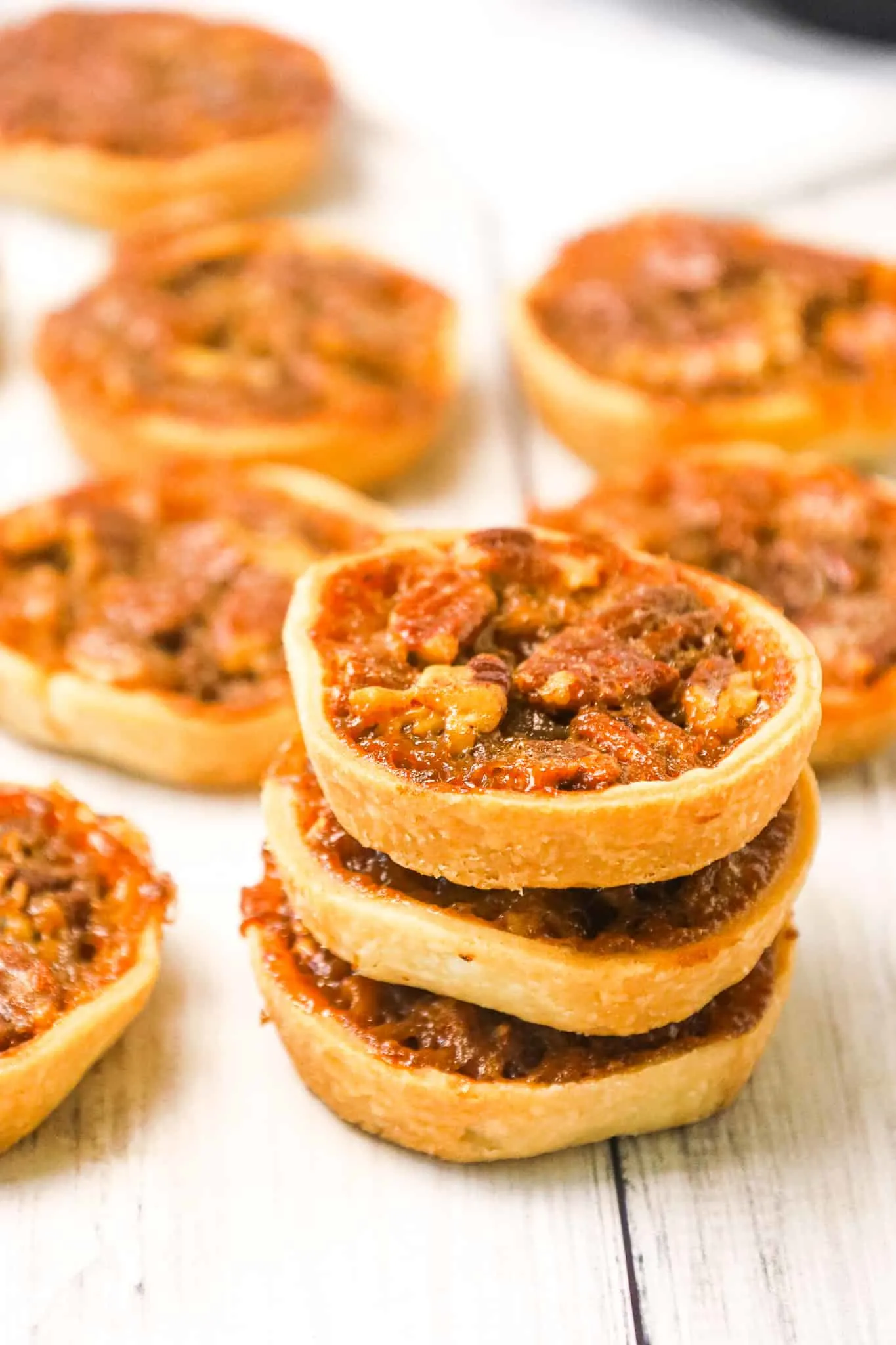 Pecan Tarts are delicious pastries with a sweet caramel and chopped pecan filling.