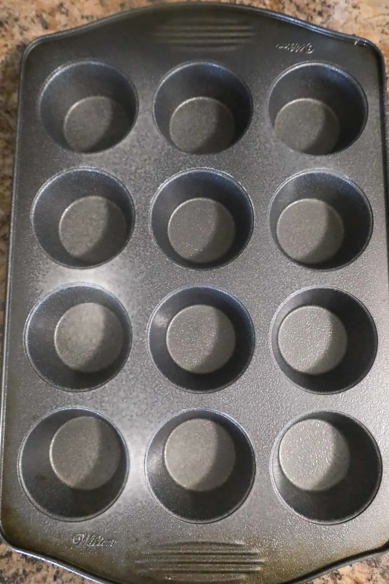 cooking spray on muffin tin