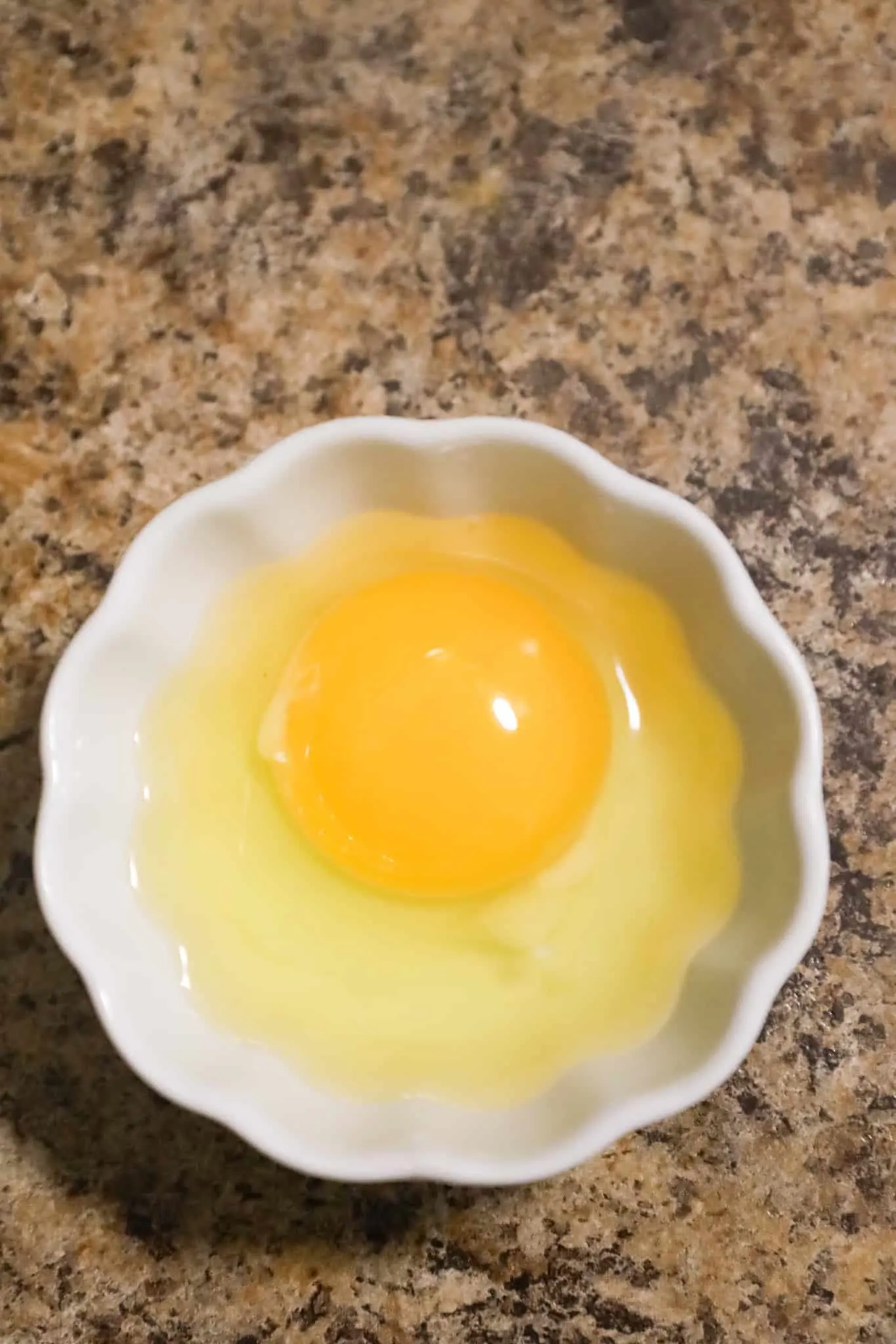 an egg in a small bowl