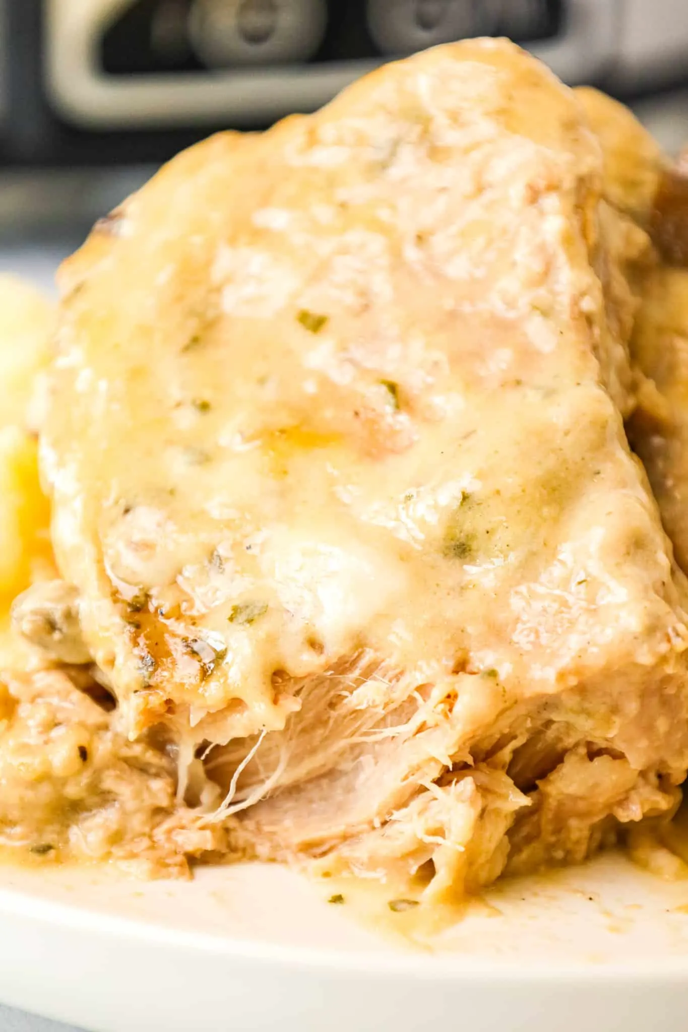  3 Ingredient Crock Pot Pork Chops are an easy slow cooker dinner recipe made with condensed cream of mushroom soup and ranch dressing mix.