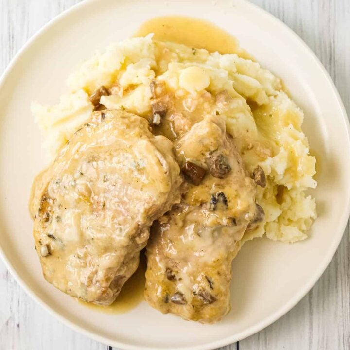  3 Ingredient Crock Pot Pork Chops are an easy slow cooker dinner recipe made with condensed cream of mushroom soup and ranch dressing mix.