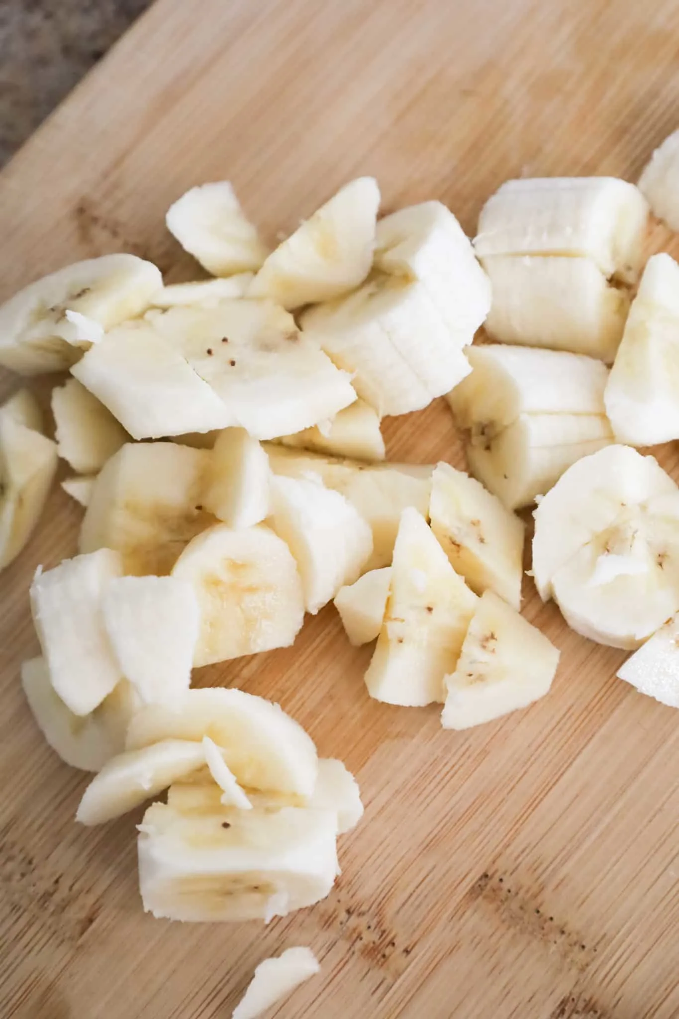 chopped banana on a cutting board